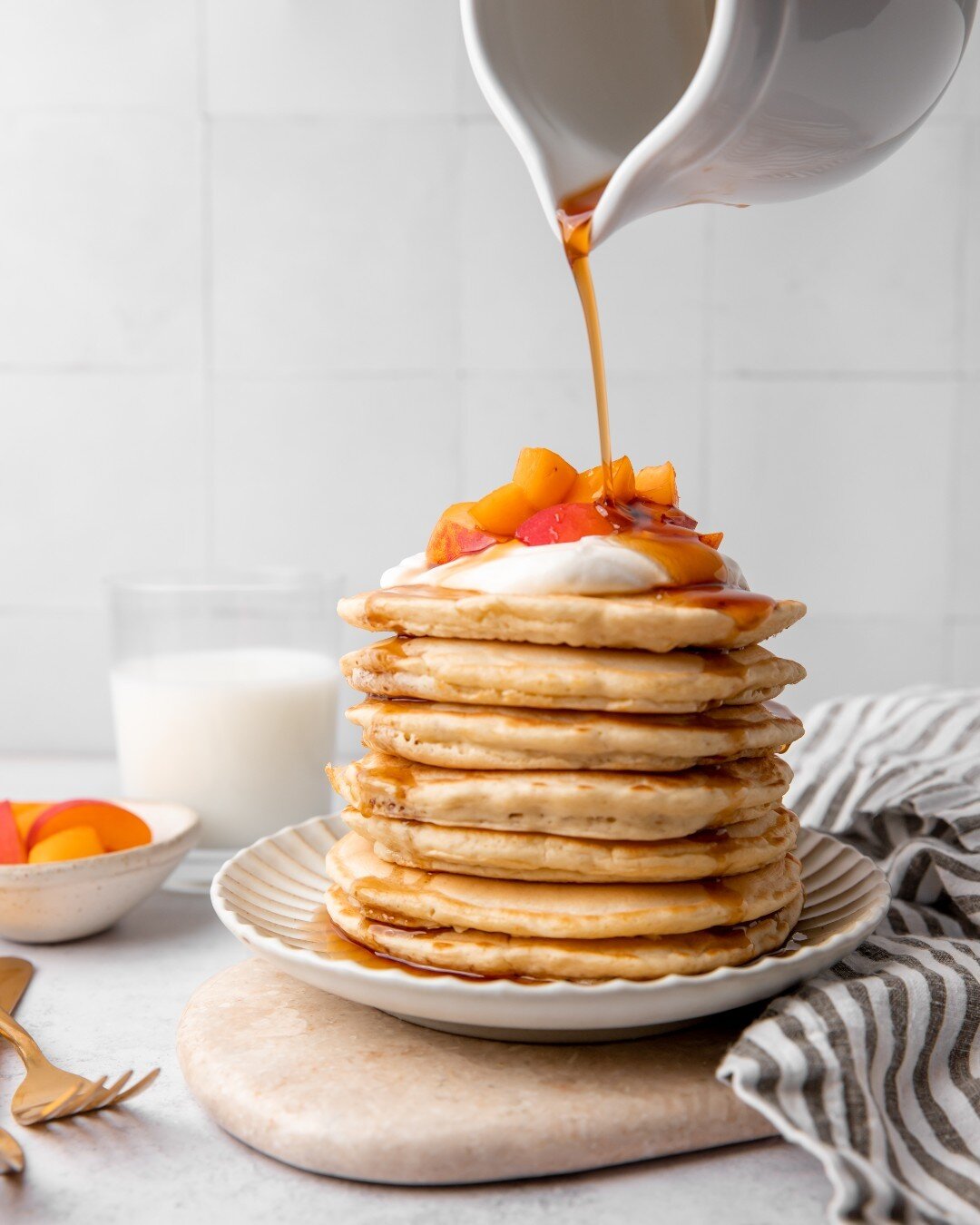 We are in the heart of peach season! Head down to you local market and grab some ripe peaches to create our scrumptious Mariani Peaches and Cream Pancakes. Link in bio.