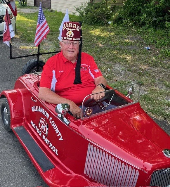 Past Grand Master Swaney at a Shriner’s event