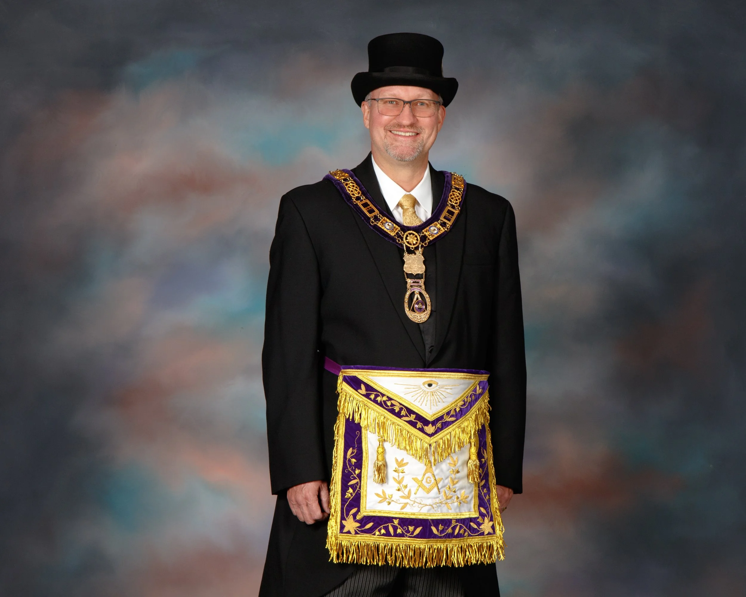 Joseph B. Ferrell, Freemason and Grand Master of the Grand Lodge of Illinois A.F. & A.M. in an official portrait wearing a Masonic apron, Masonic regalia, and top hat