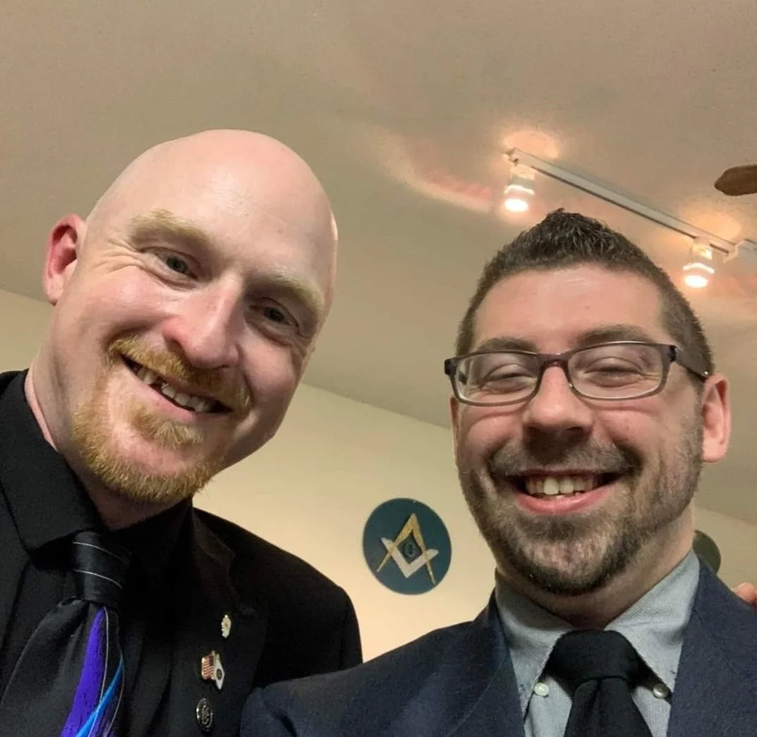 A selfie of WB Jeffrey Armour and Brother Steve Fararre, Illinois Freemasons, smiling at the camera in a Masonic lodge