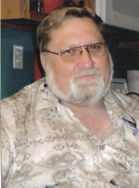 WB Randy E. Jones, an Illinois Freemason, in glasses, looking at the camera