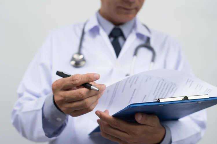 doctor writing a prescription