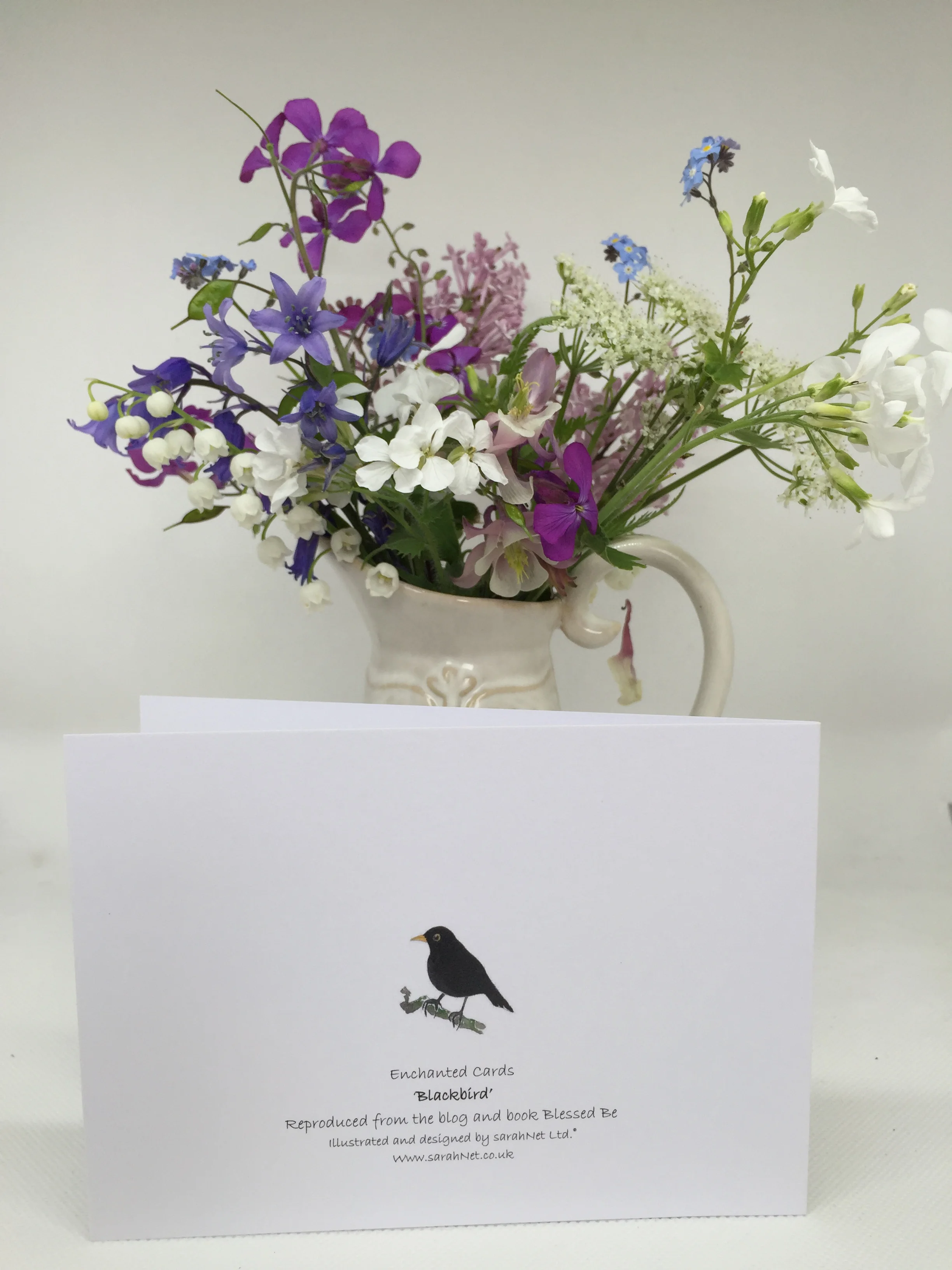 Blackbird with flowers
