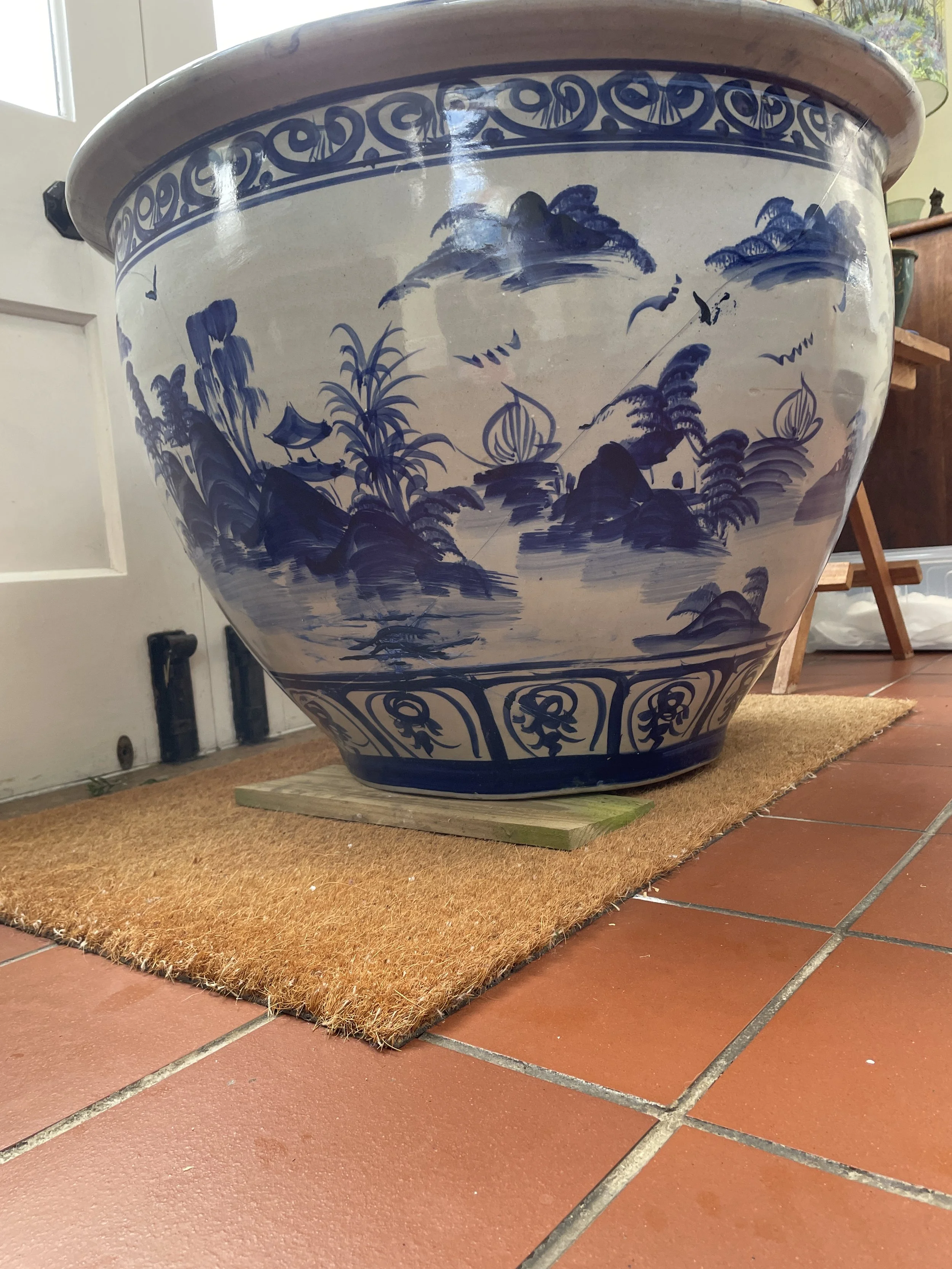 Side with hole and cracks after repaint