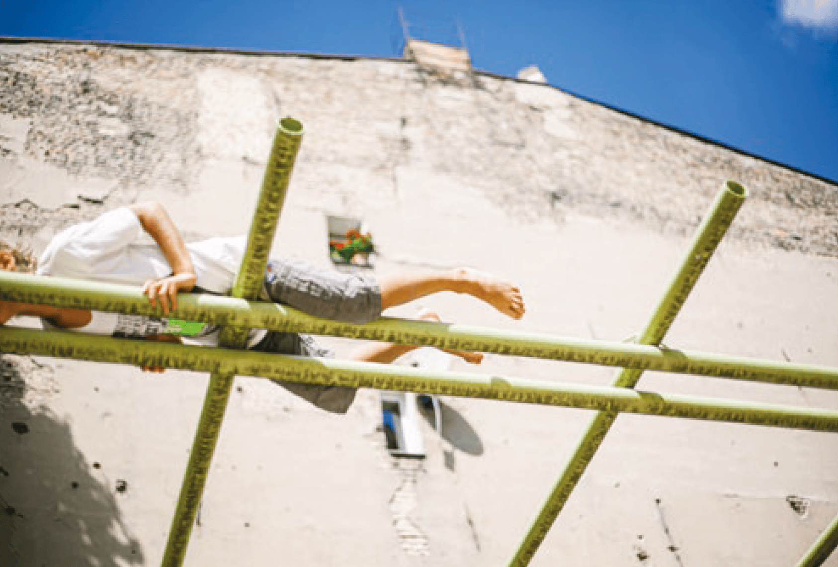 boy-climbing-roof-berlin-djunivers.png