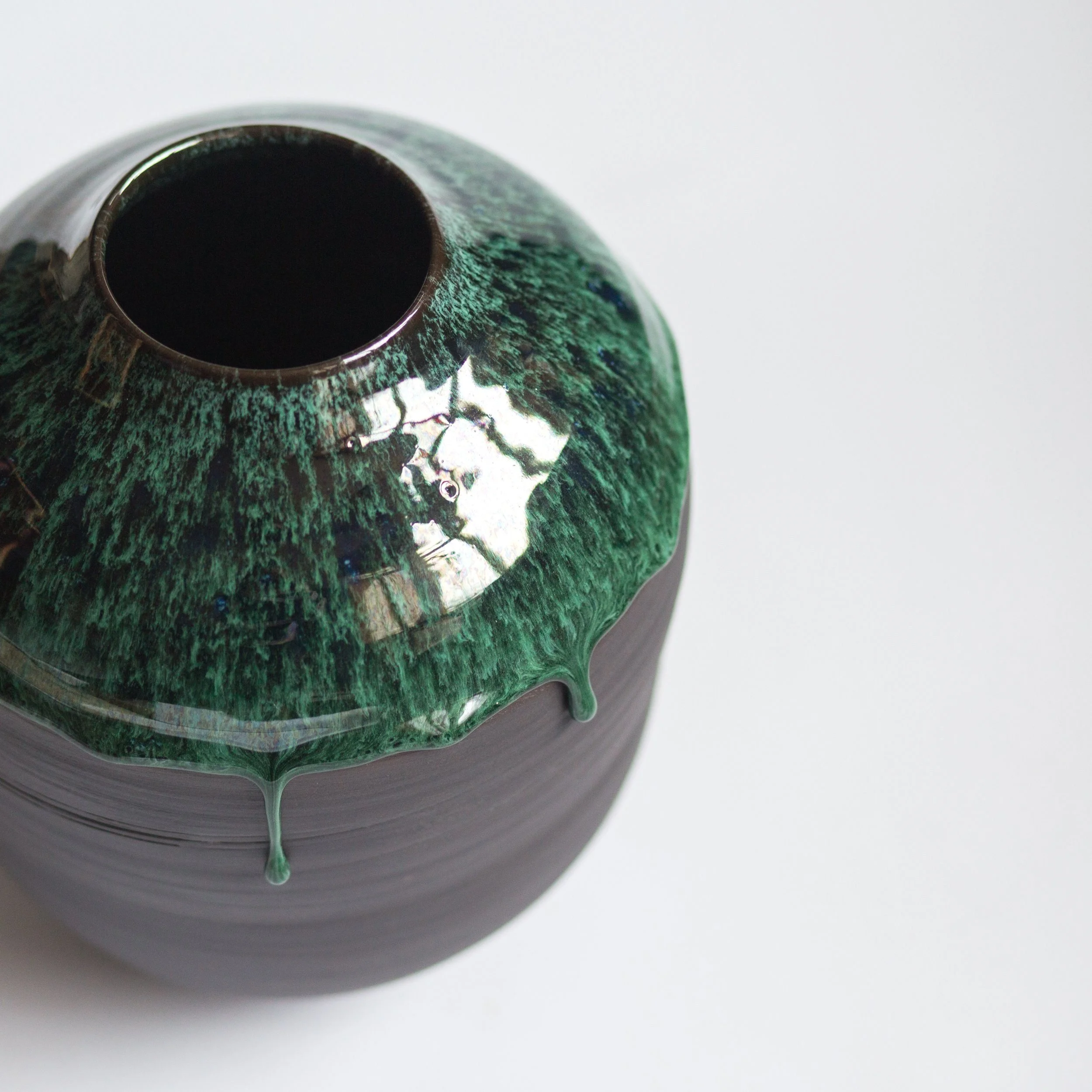 Large lava onyx black porcelain moon jar with copper green Icelandic