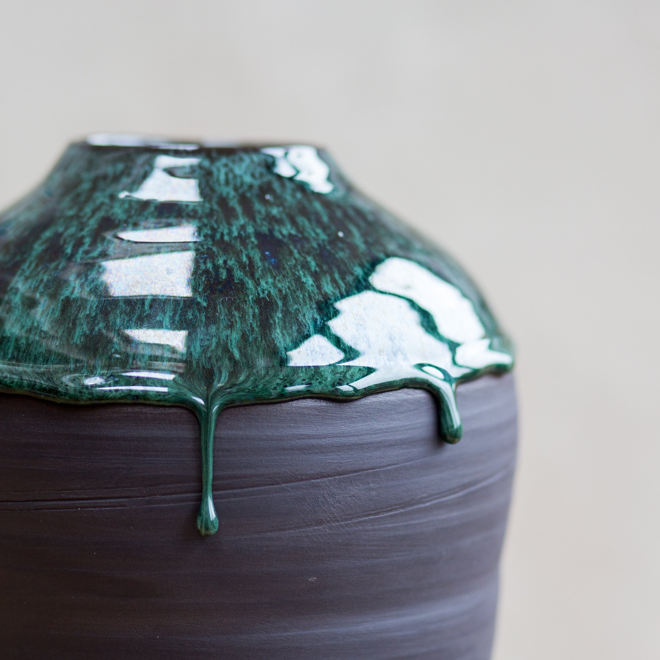 Large lava onyx black porcelain moon jar with copper green Icelandic