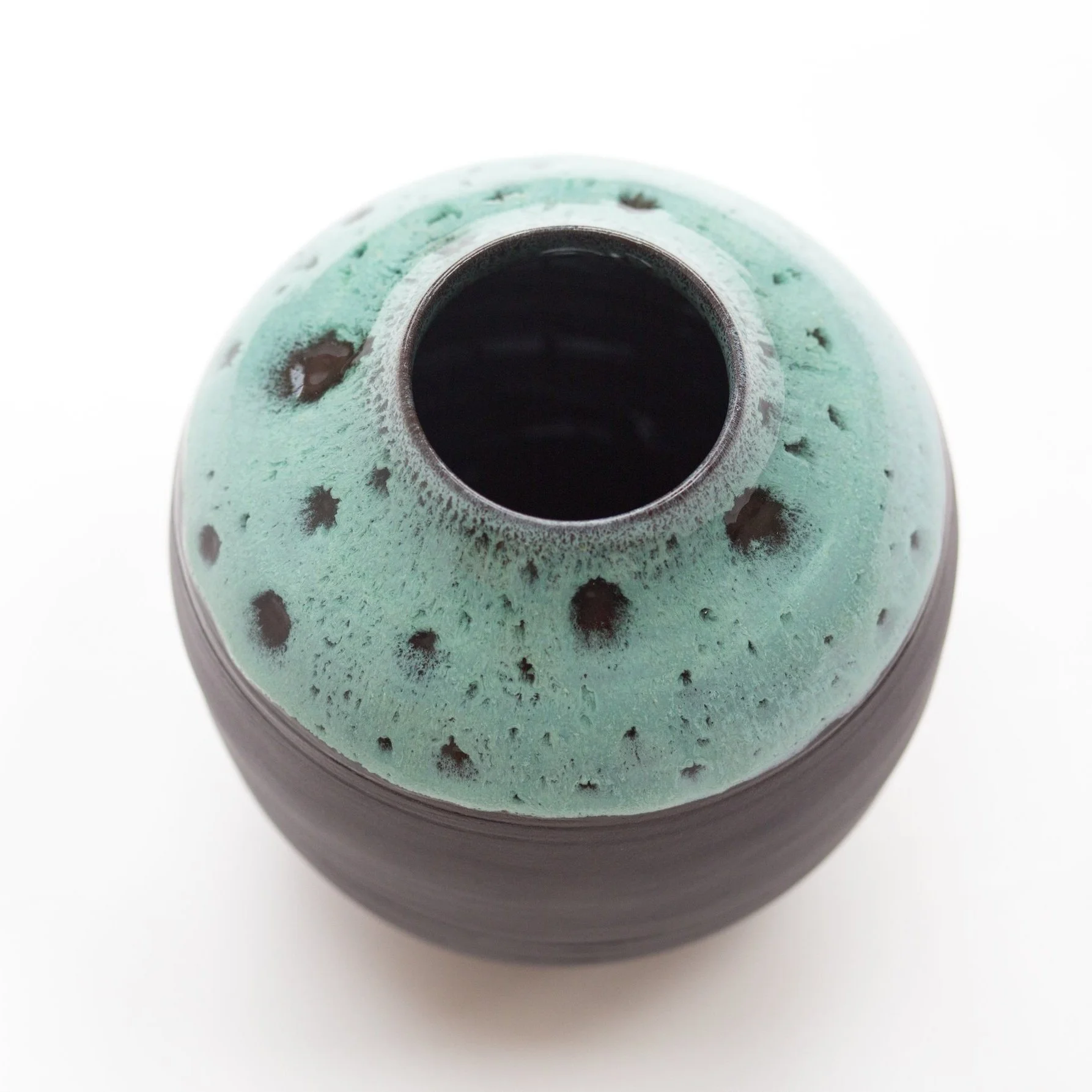 Medium onyx black porcelain moon jar with light copper green (limited