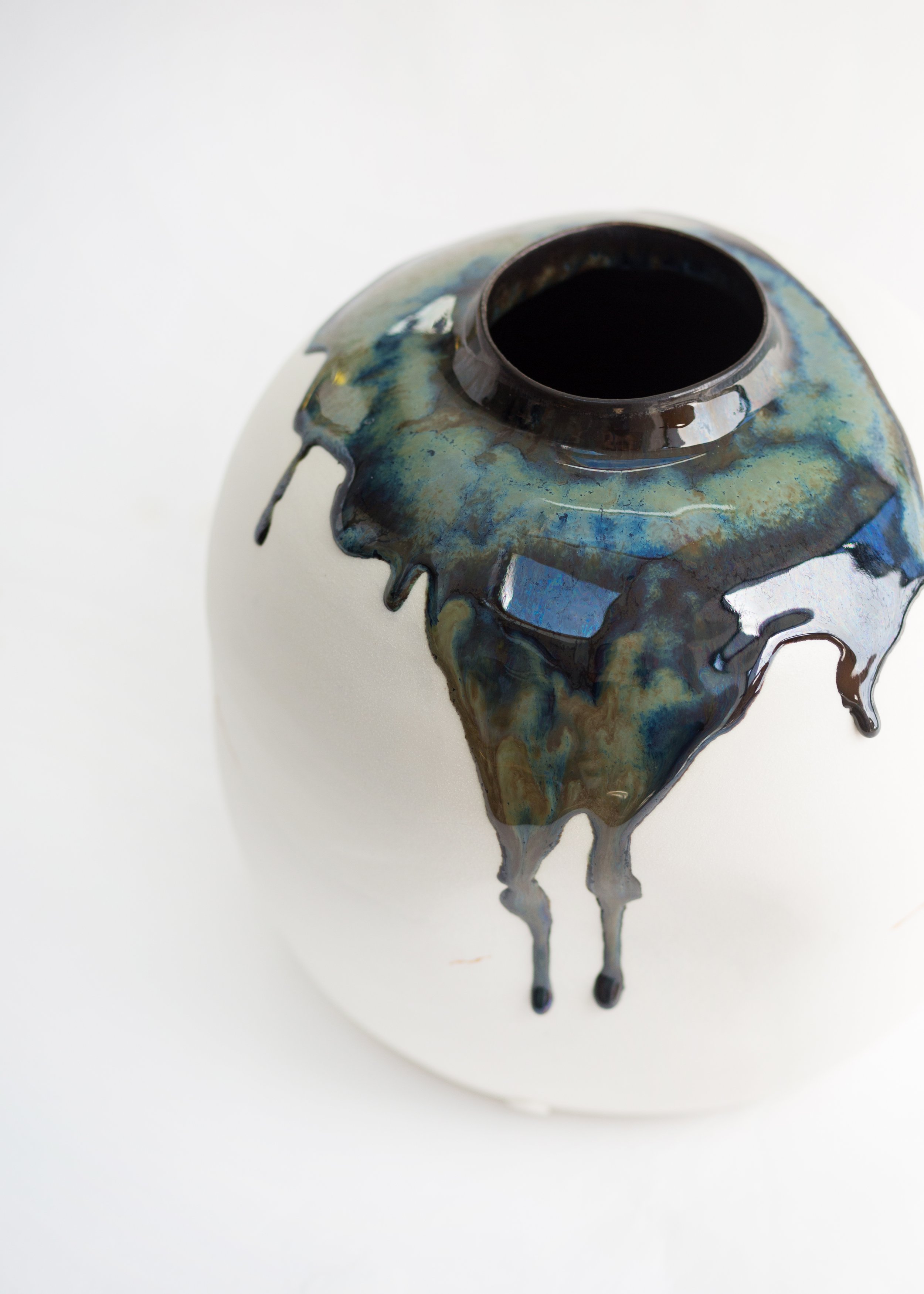 KA Ceramics Abstract Tenmoku moon jar with kintsugi details. Dimensions 8cm x 30cm. Photograpy Clare Bowes. 860 2.jpg