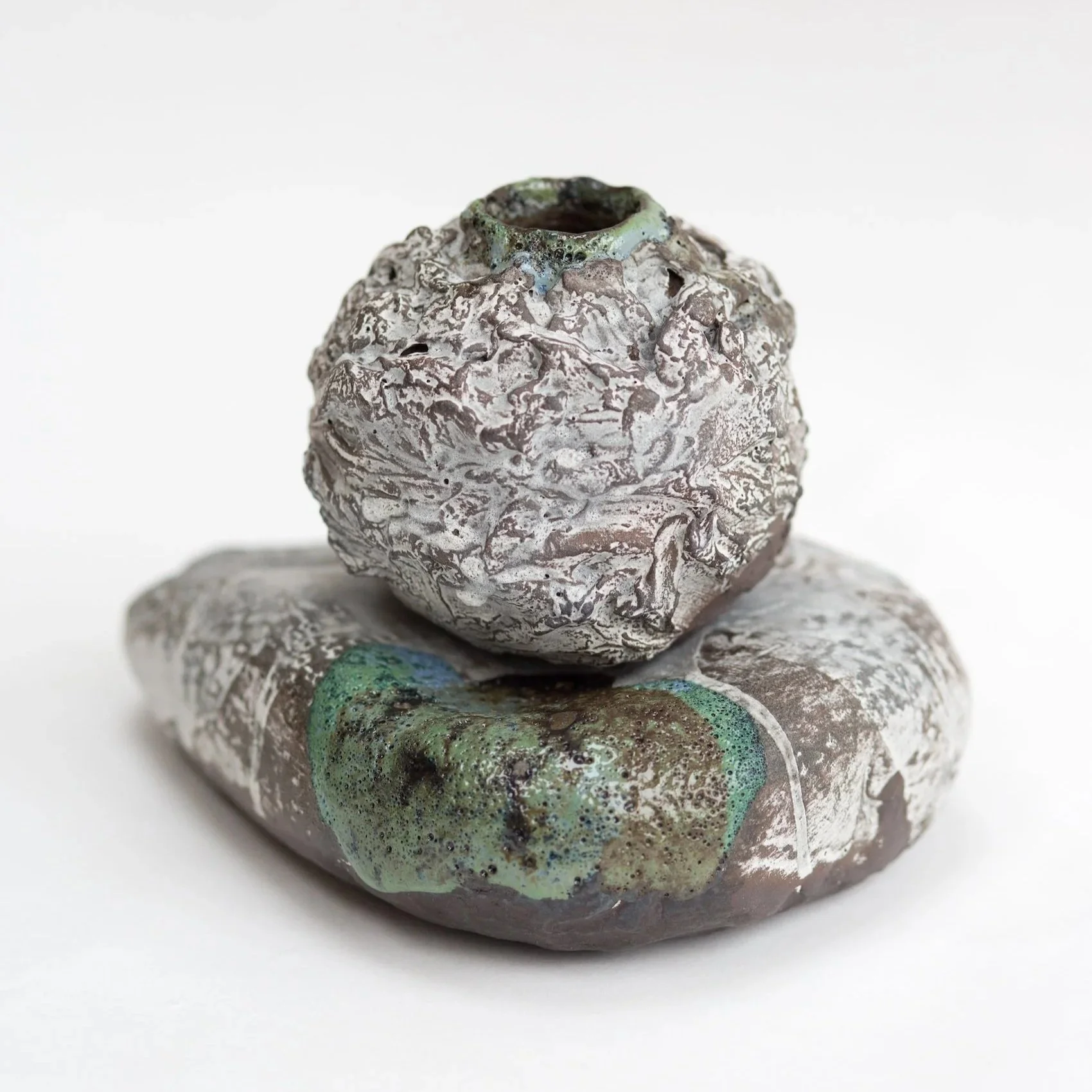 3.Kirsty+Adams+Ceramics+Cullernose+moon+jar+and+holey+stone+Schwartz+clay+textured+20cm+x+19cm+3+copy.jpg