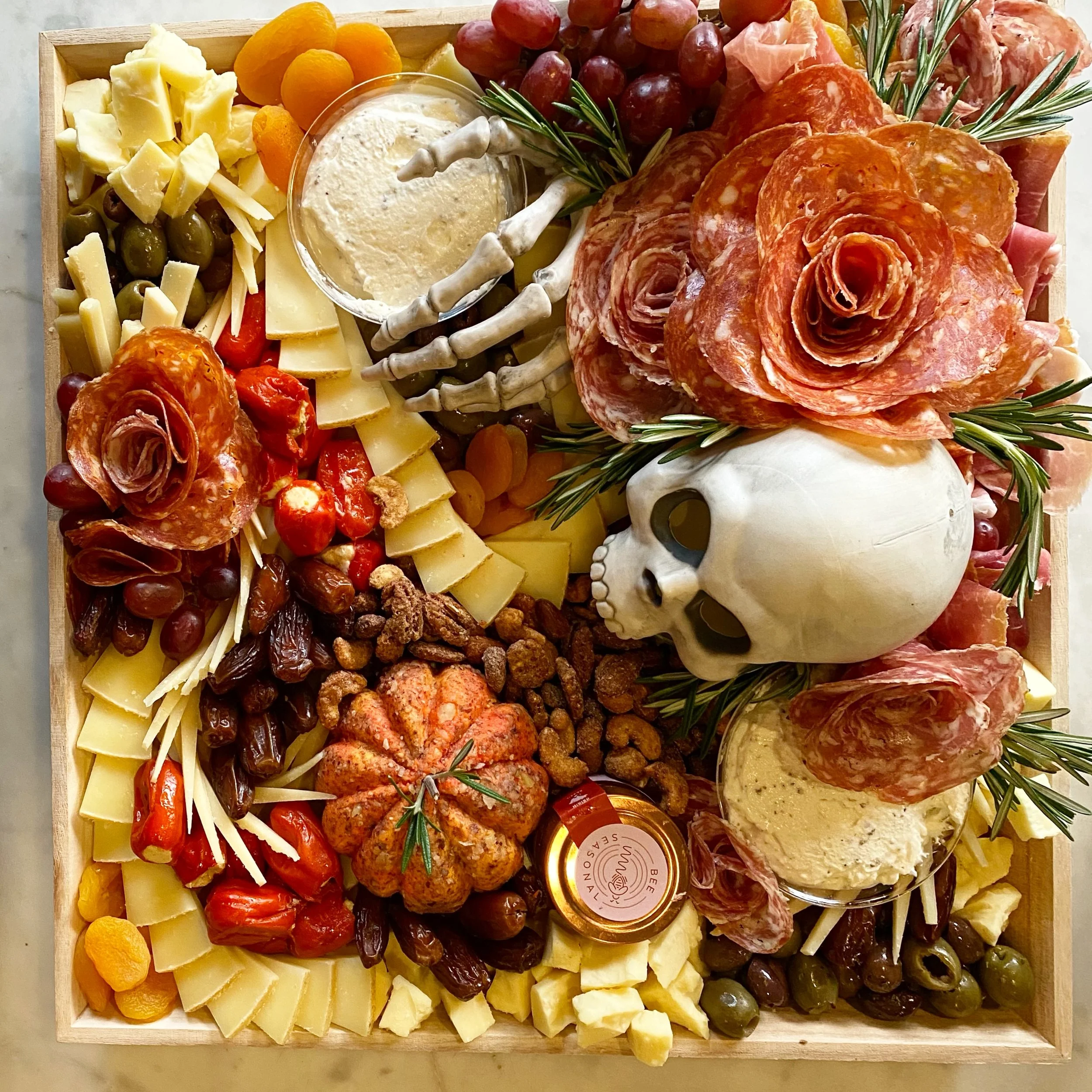 Need some spooky ideas for Halloween themed boards? Here are a few of my top 5 tips for making a memorable cheese platter 

👻 props go a long way here. Wash them, plate them into the board. Think skulls, skeleton hands, ghost shaped dishes etc

👻 t