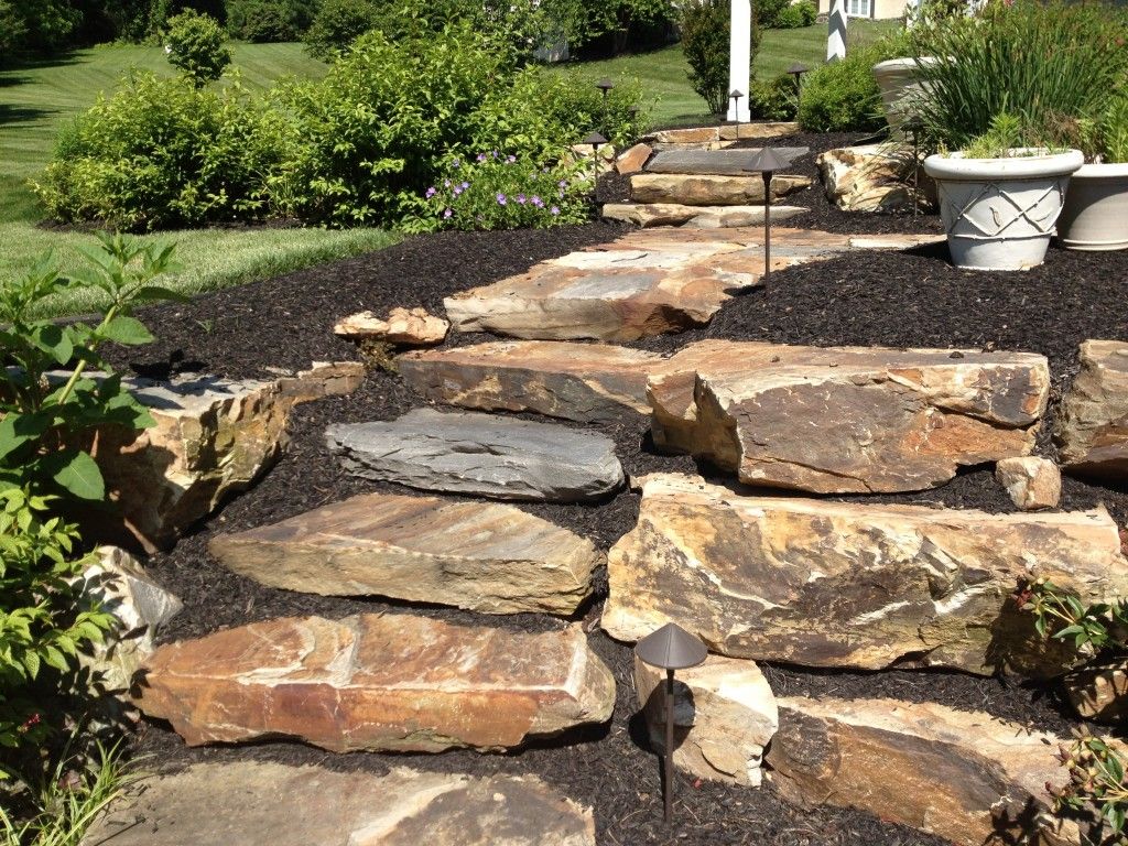 Natural-stone-garden-steps-ideas-with-iron-garden-lighting-and-white-potted-plants.jpg