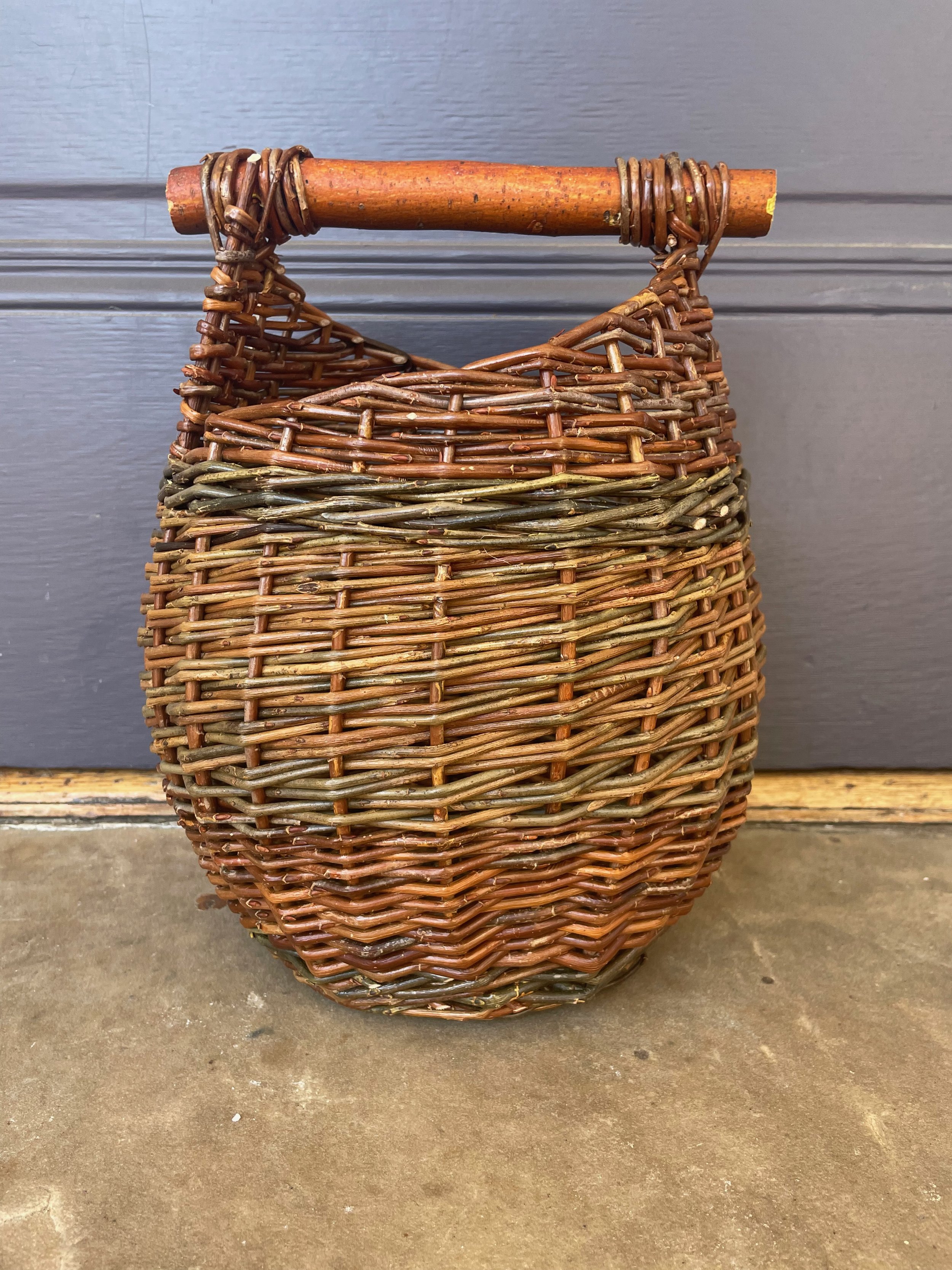 Asymmetrical willow purse with crabapple handle