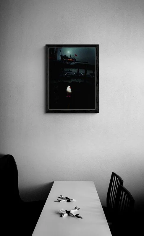 Restaurant_dining_table_with_black_chairs.jpg