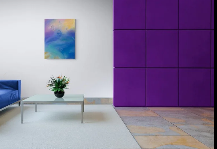 Colorful pastel art hanging on a wall