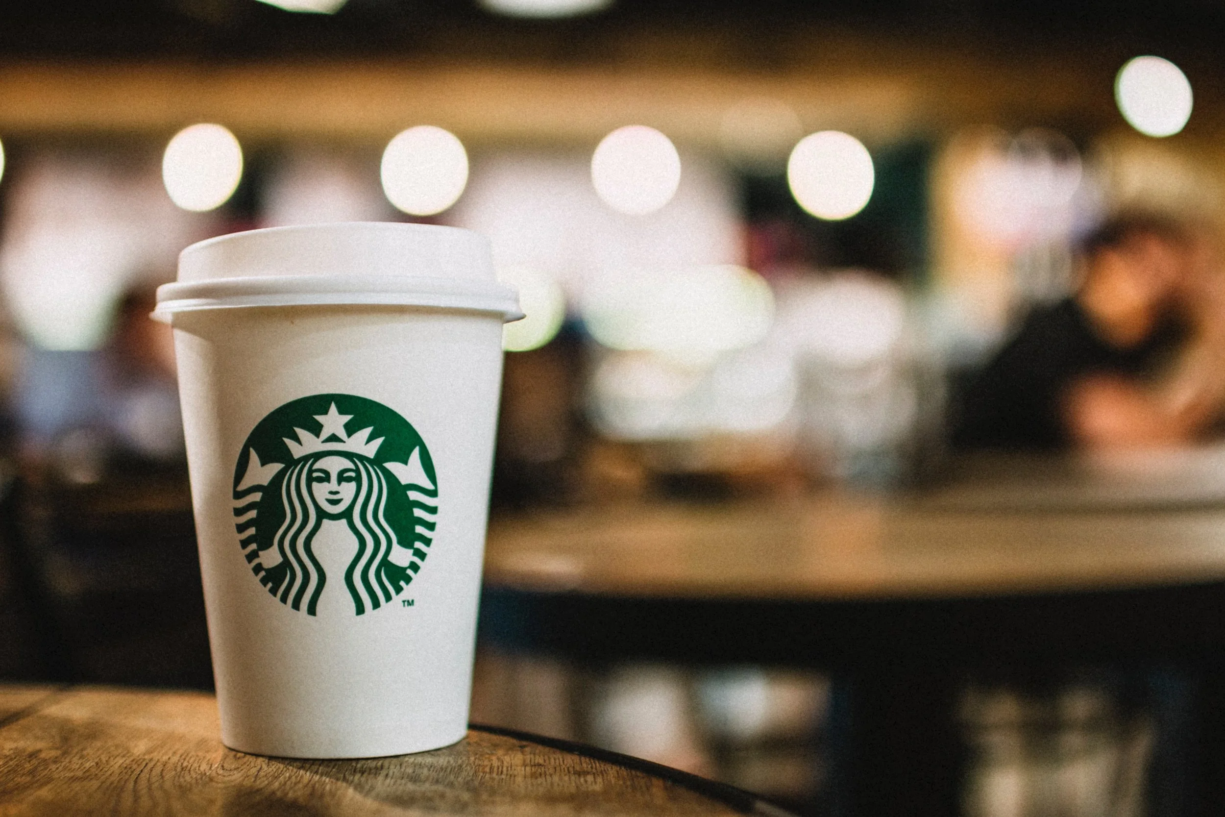 Starbucks (pictured) spends more on employees than they do on coffee. They understand the importance of a happy, enthusiastic team.