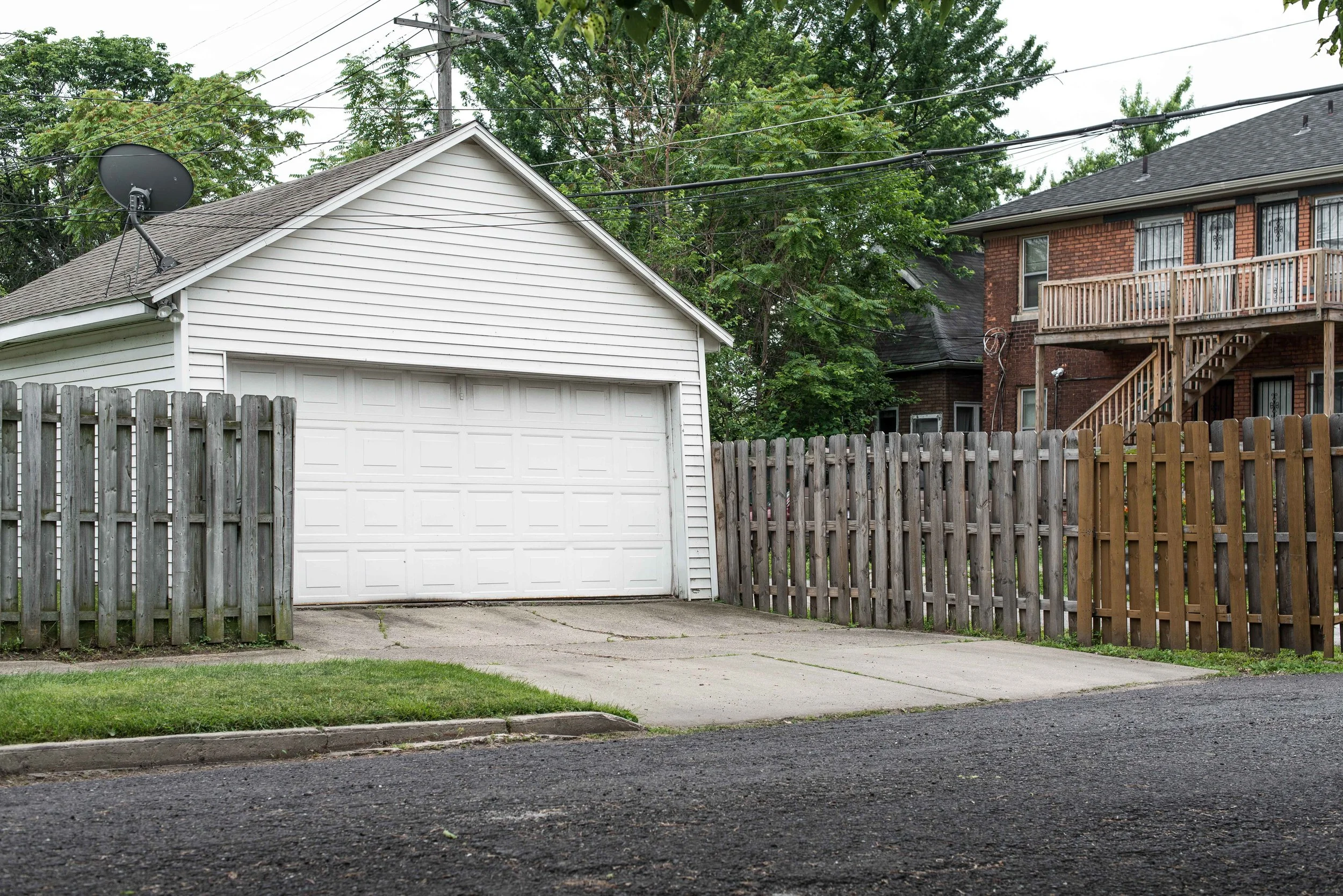  Grosse Pointe Side of Brooks Street Closing showing how not only did the street end, but also the sidewalk into Detroit. The Homeowner chose to also fence in their yard. 