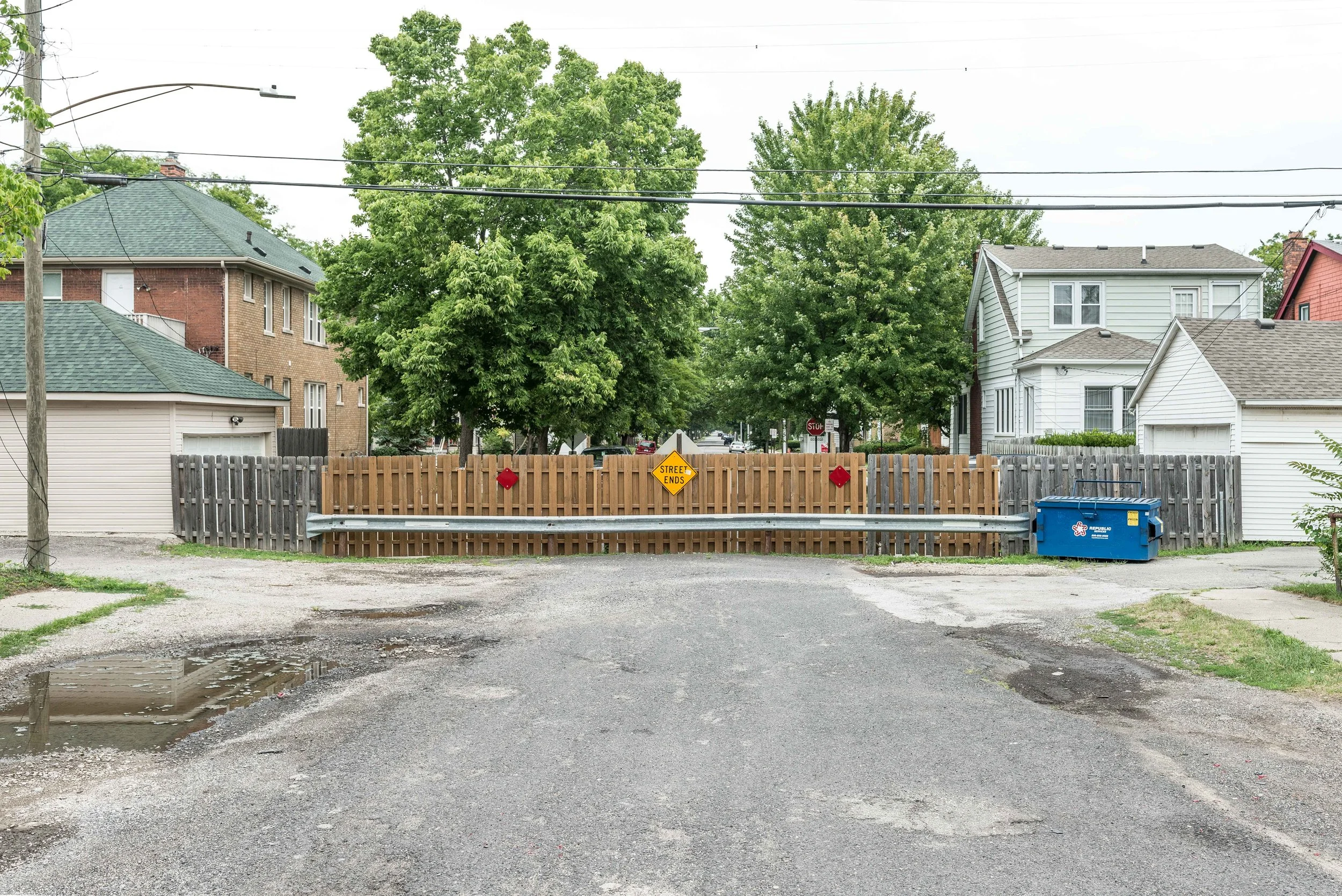  Detroit side of Brooks Street closing. No curbs or manicured sidewalks. 