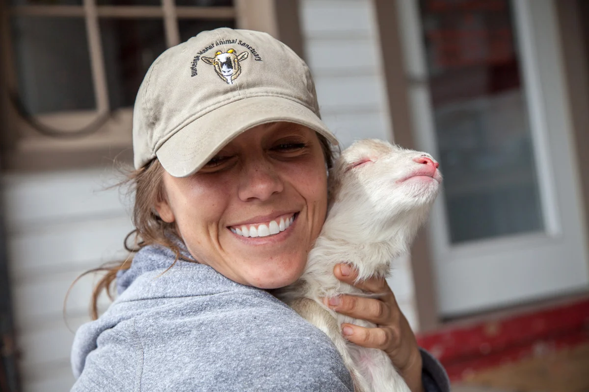 Farmer Deb Dramby and Number 23, after his tube feeding
