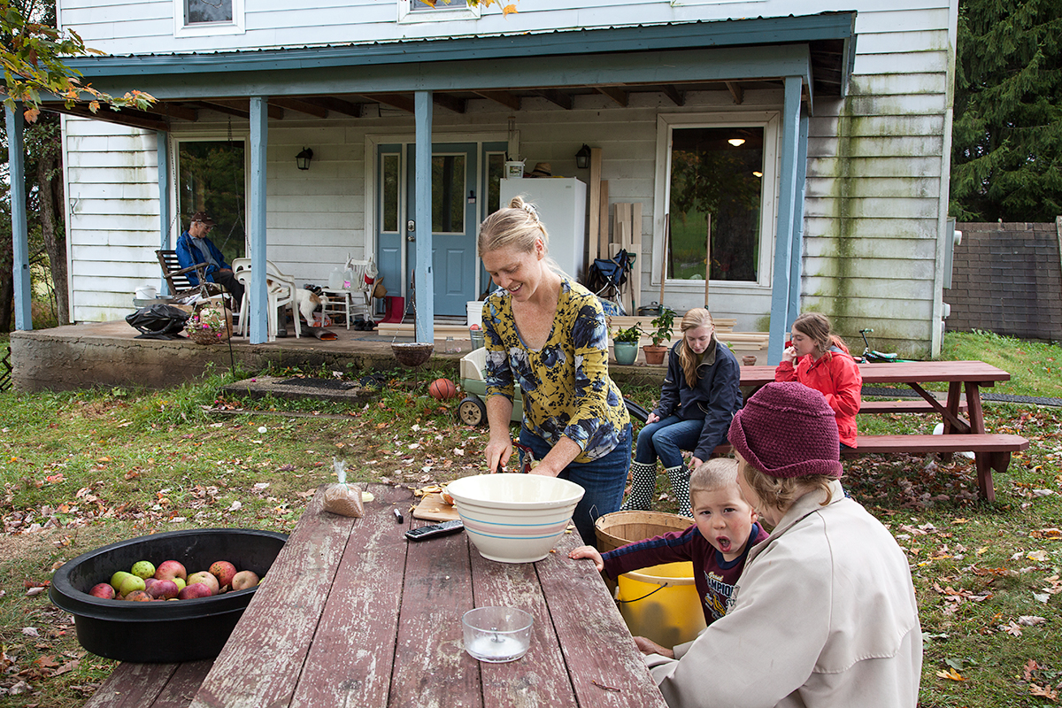 Prepping the apples for applesauce, lots and lots of apples, became a family event