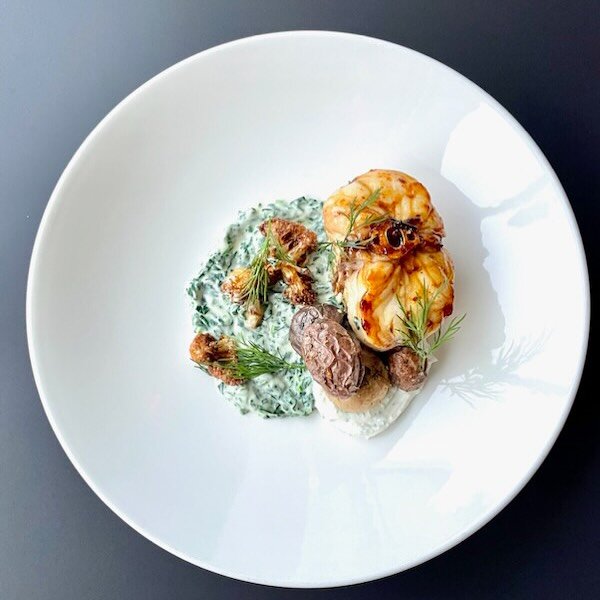 Pan-Roasted Monkfish &bull; lightly smoked, roasted cauliflower, creamed spinach, baby potatoes and dill, cr&egrave;me fra&icirc;che, apple cider
glaze

📸 @branpanobread #tra1900 #1900bldg