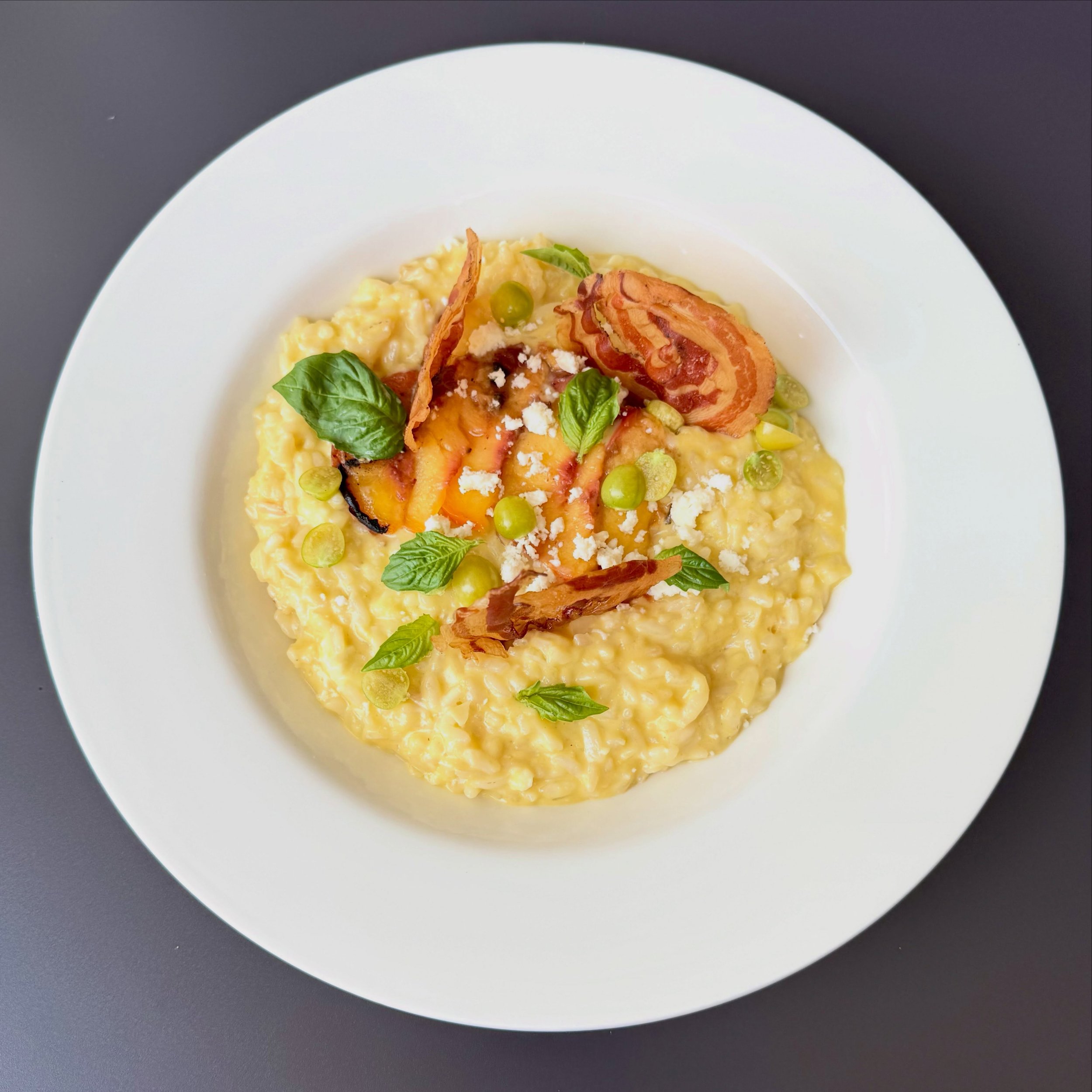 Sweet Corn Risotto &bull; grilled peaches, opal basil, crispy pancetta, cotija and queso fresco cheeses

Duroc Pork Ribs &bull; stone fruit and pickled 1900 garden melon and cucumber salad, yuca fritters, harissa a&Iuml;oli 

Lunch and dinner menus ✨