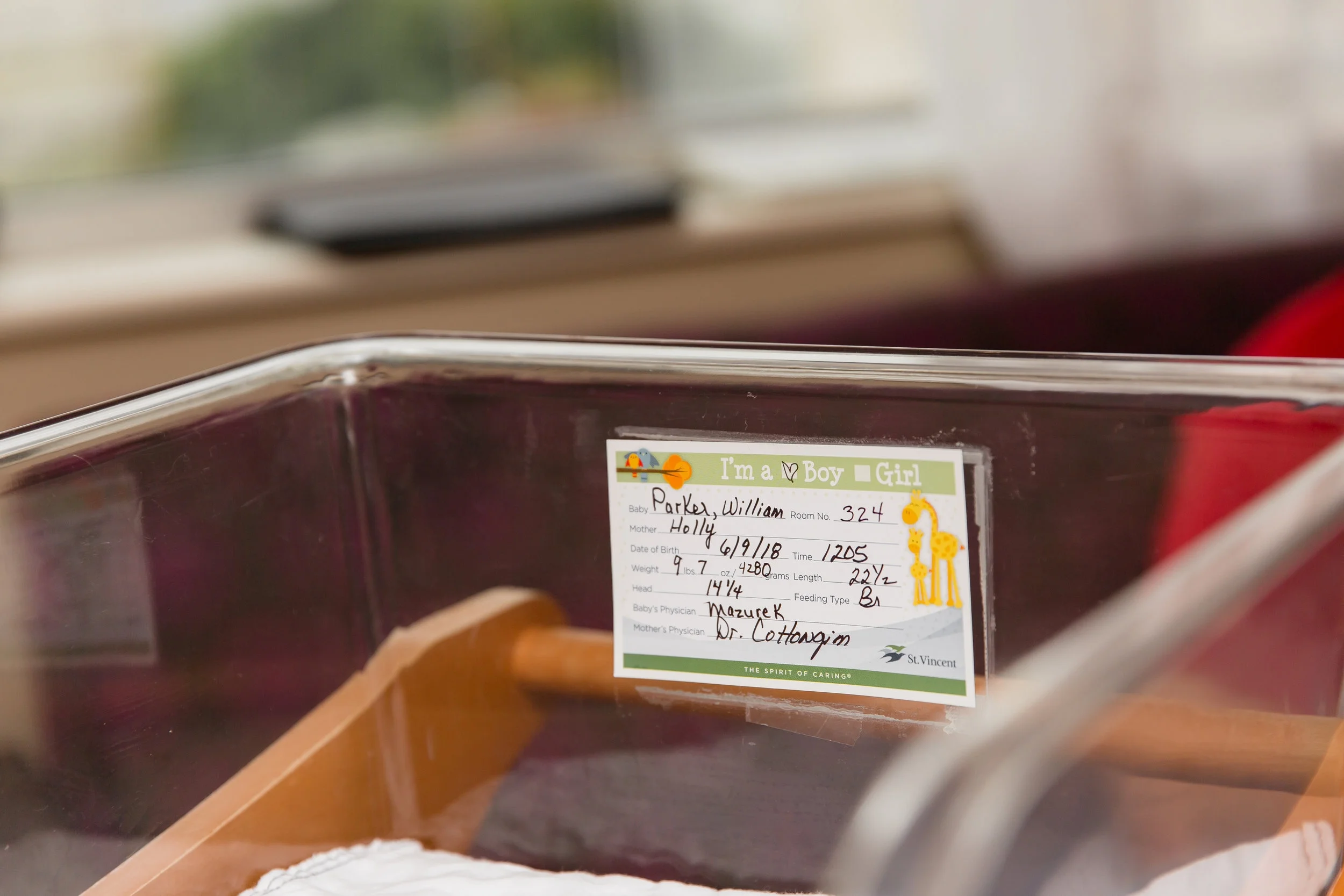 newborn baby hospital session close up of the name plate