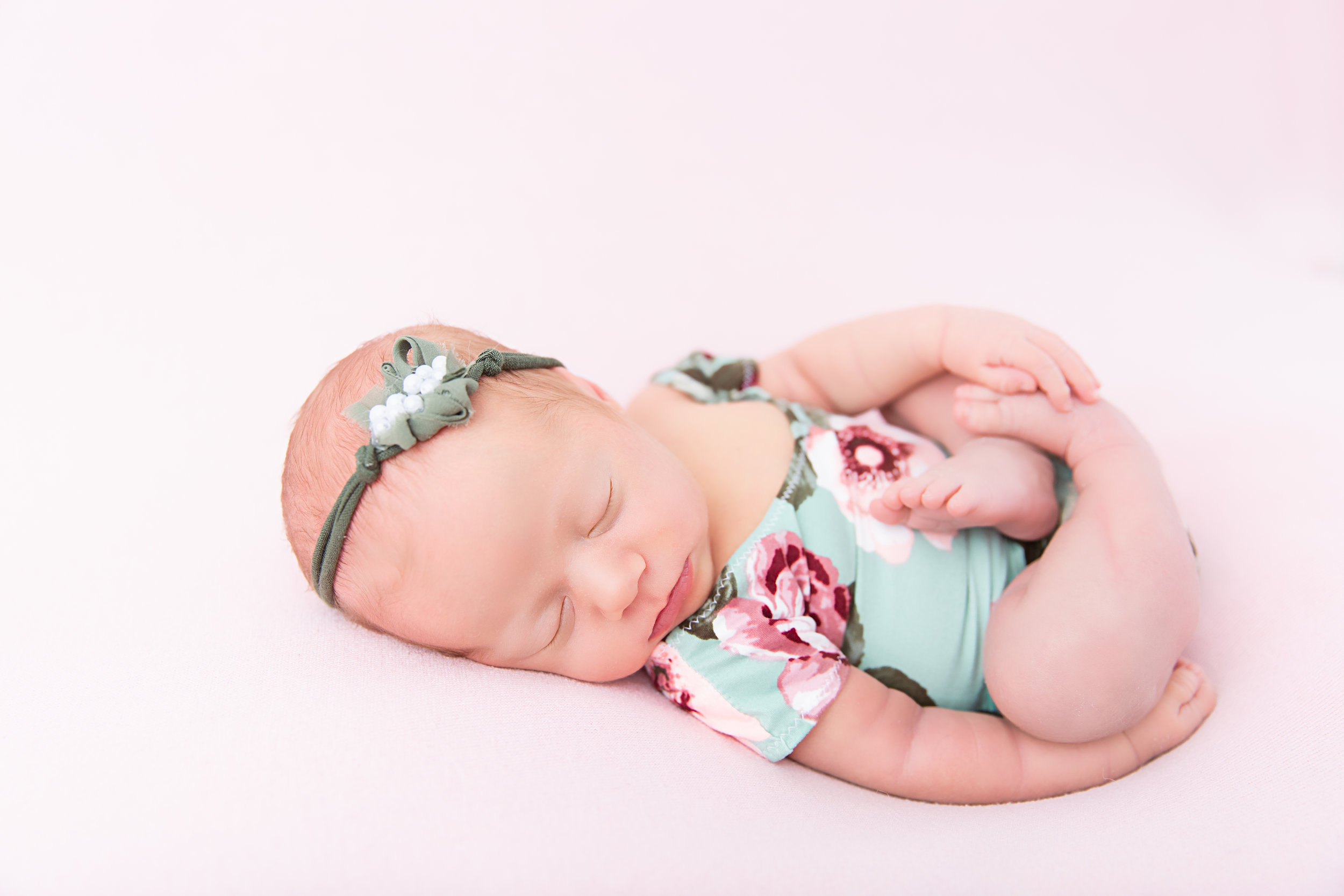 posed newborn baby sleeping