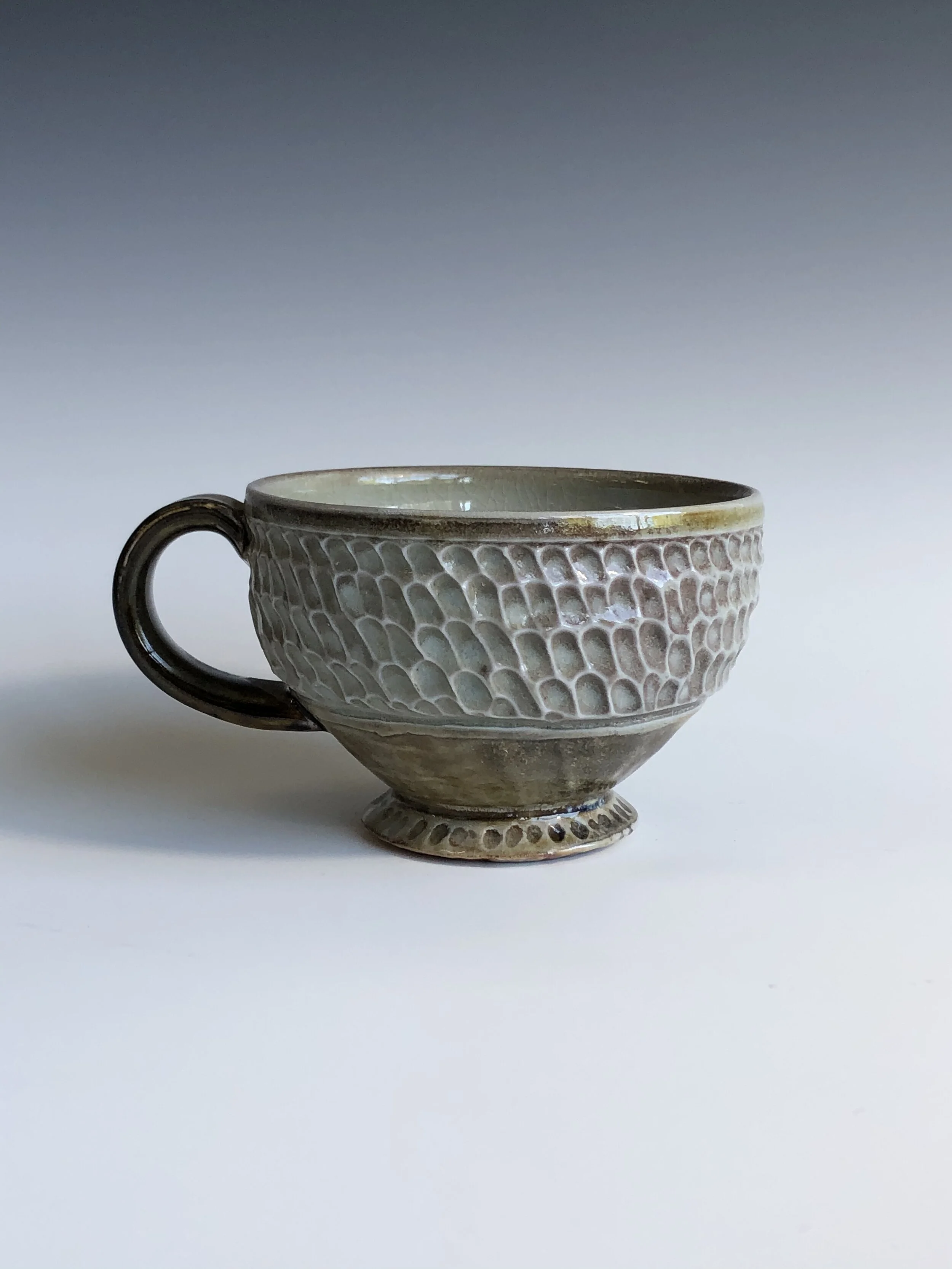 Faceted teacup  |  Jacy Robinson