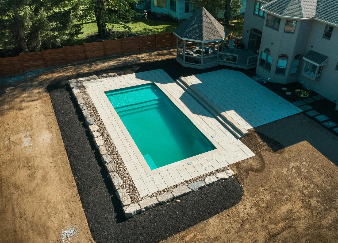 Saltwater. Stone. And a backyard that feels instantly finished.

This Oasis pool was designed as one complete space: a saltwater pool, a paver patio for barefoot mornings and late-night hangs, and matching coping to tie every detail together with a c