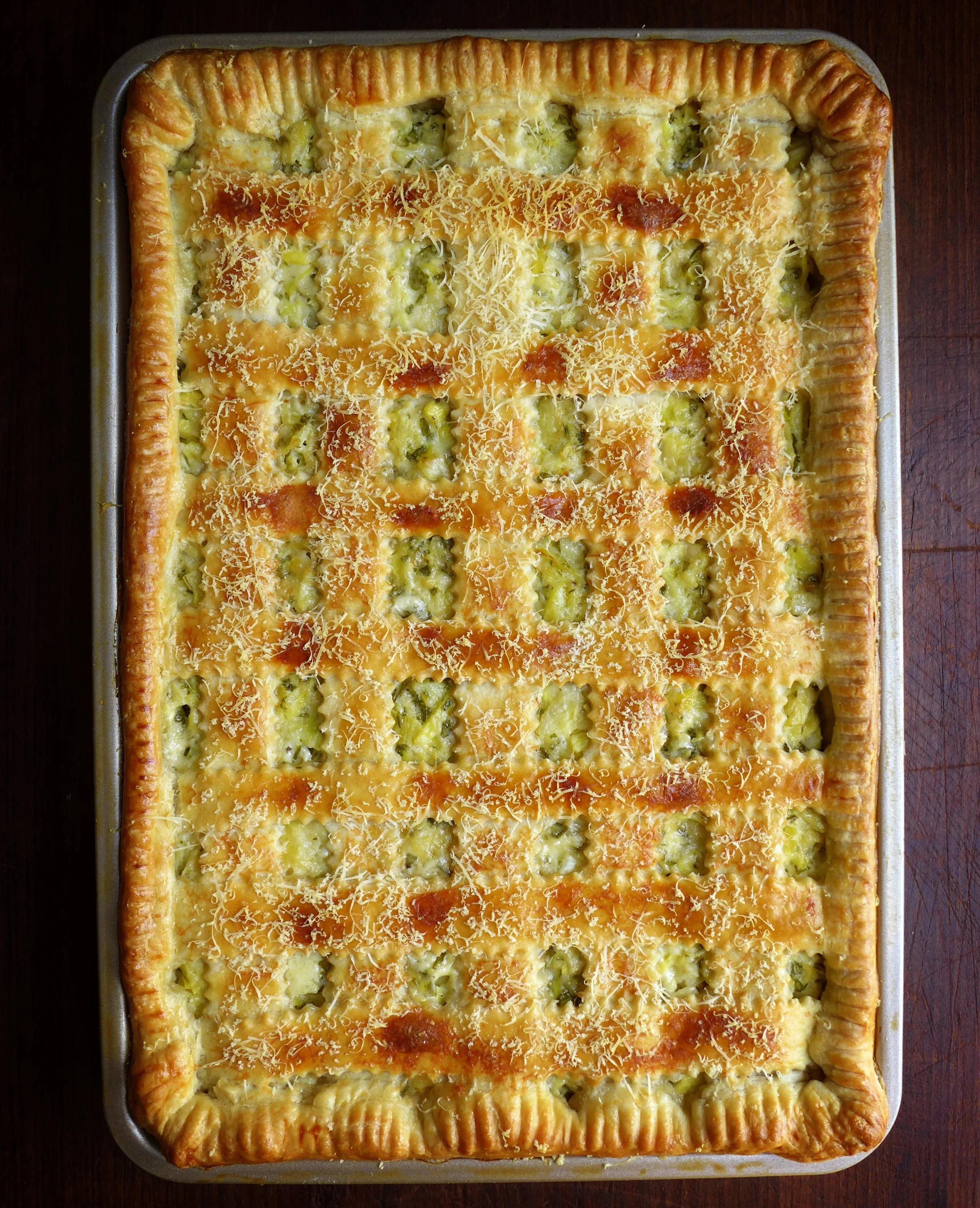 JUST-LIKE-ARTICHOKE-DIP SLAB PIE with a Cream Cheese Crust_photo credit Christopher Hirsheimer.jpg