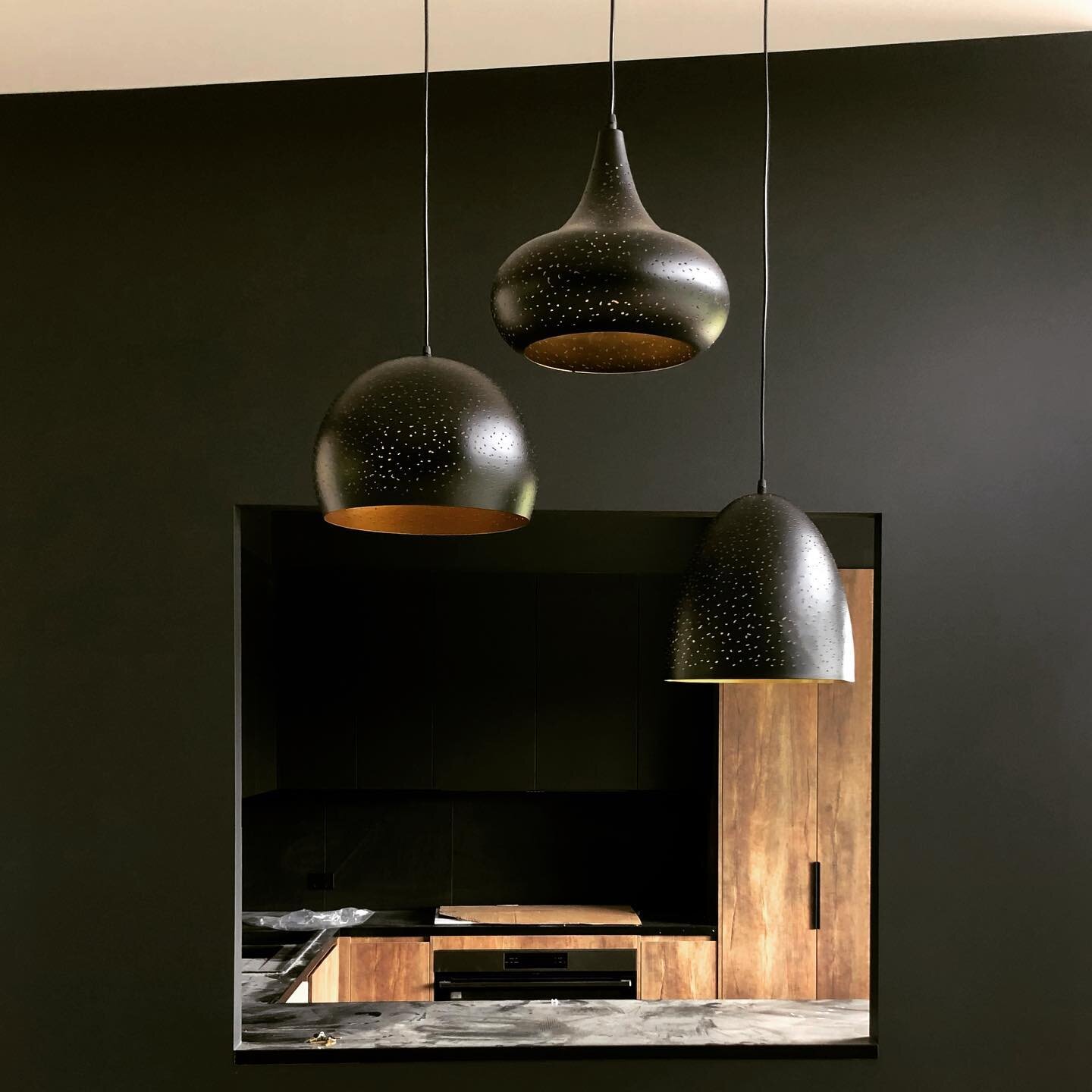 These beautifully placed pendants turn a service window into a stunning  feature for this modern + moody home. 

Electrical &bull; @bwelectricalanddata
