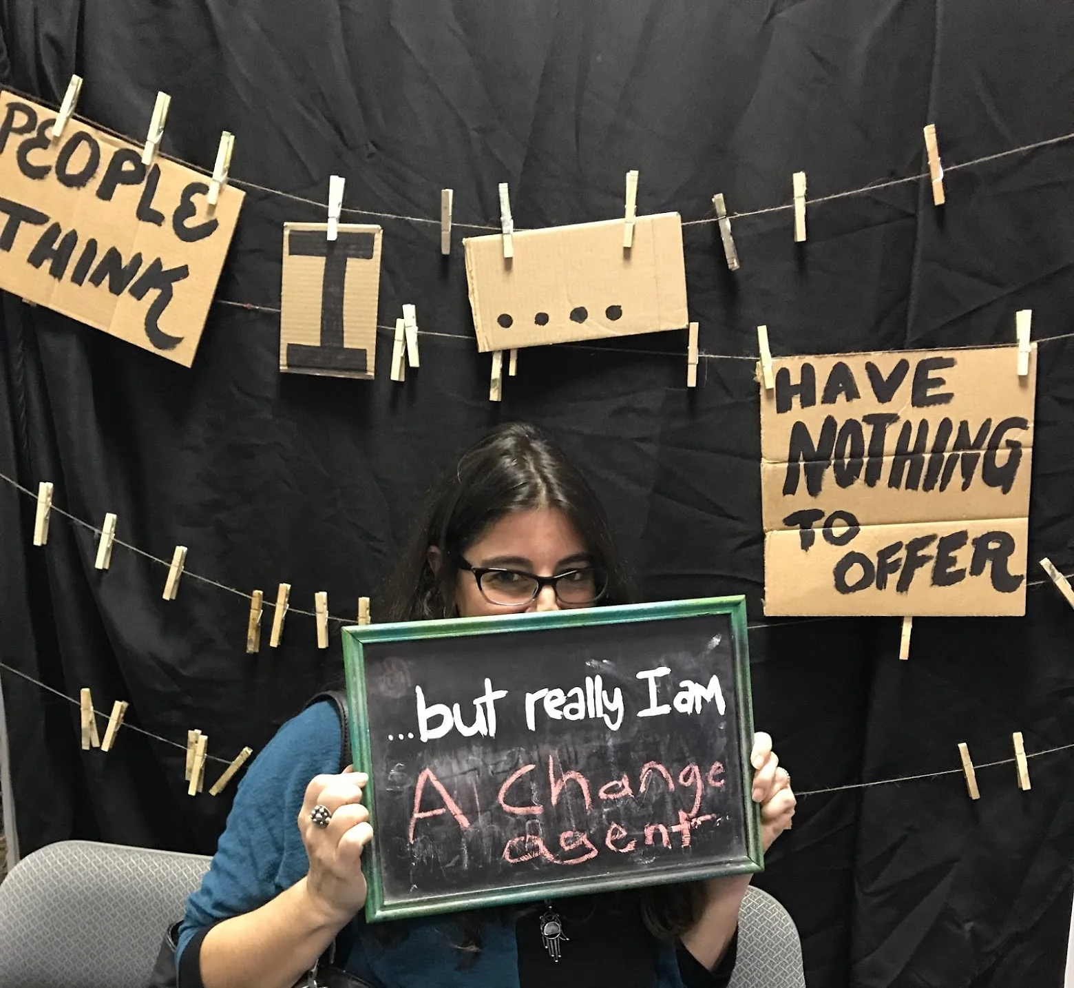 girl holding sign
