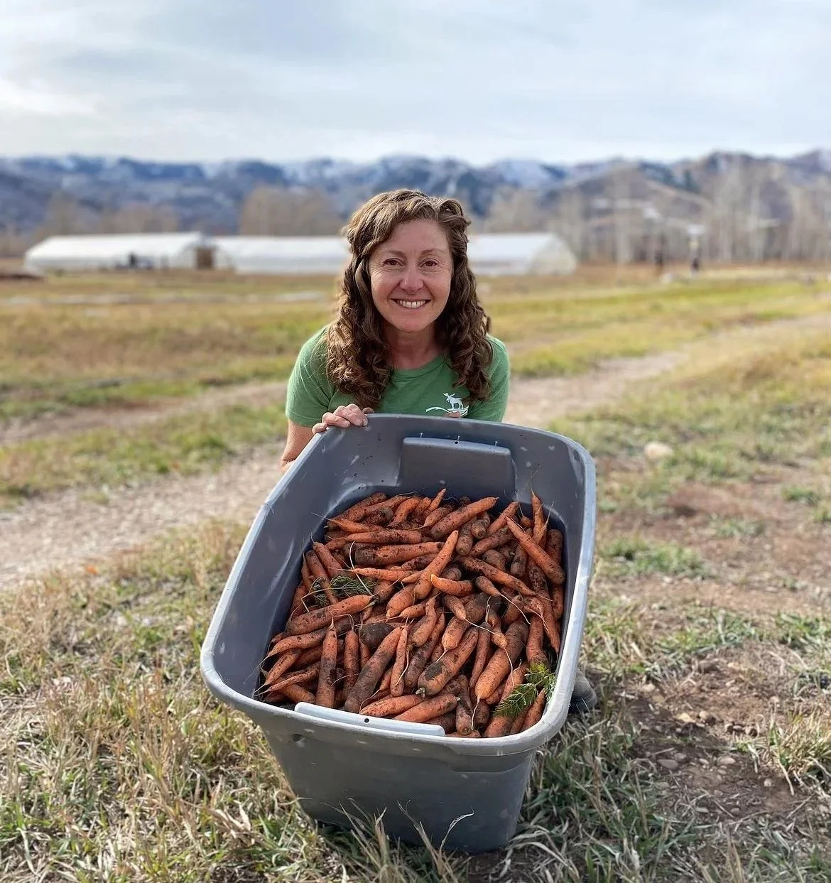 helen with bin of carrots.jpeg