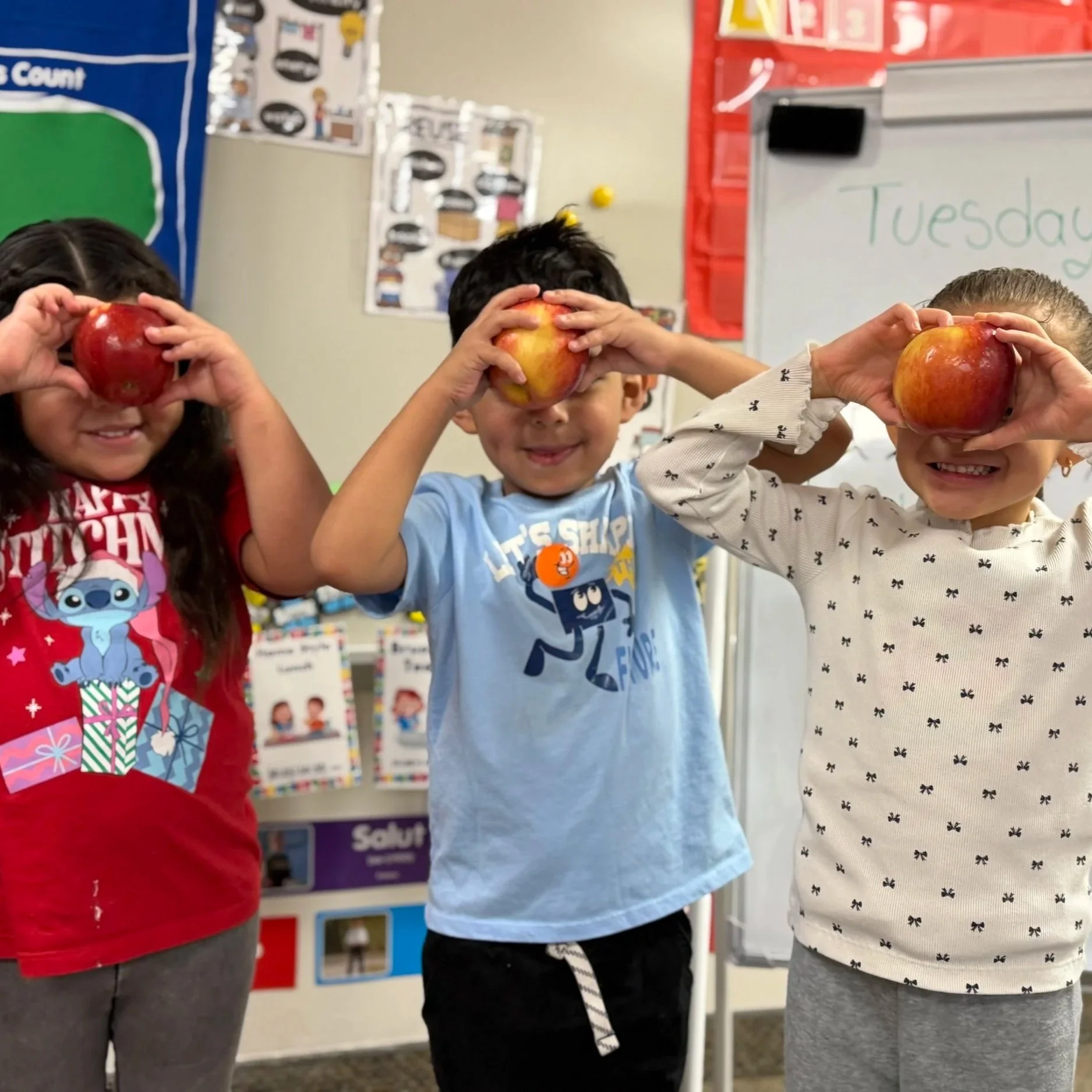 HCM+-+fruit+to+schools+apples+on+foreheads.jpg