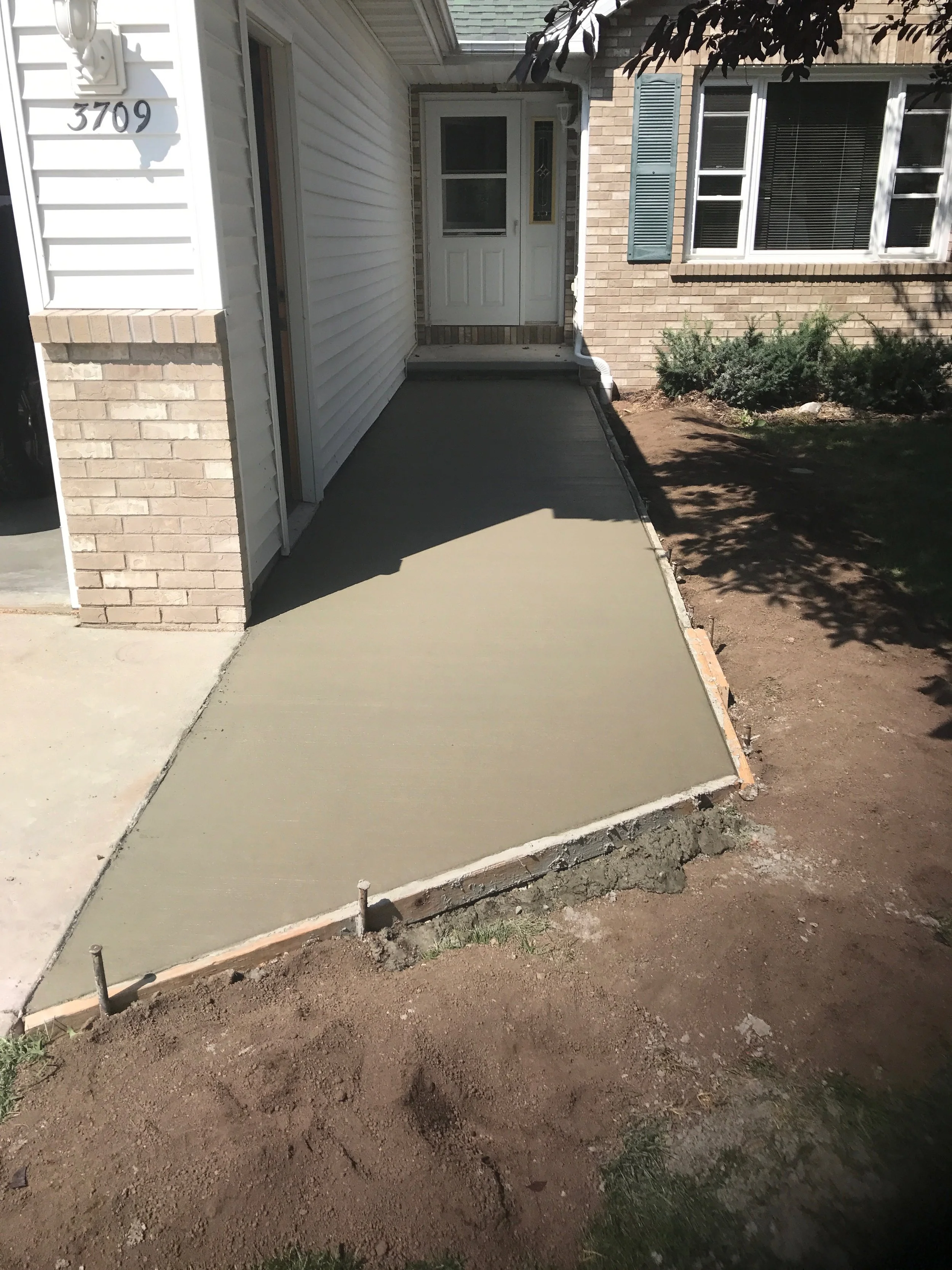 Broom finish front entrance