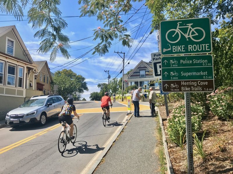 Wayfinding helps orient people to the town’s layout and encourages them to bike the short distances between common destinations.