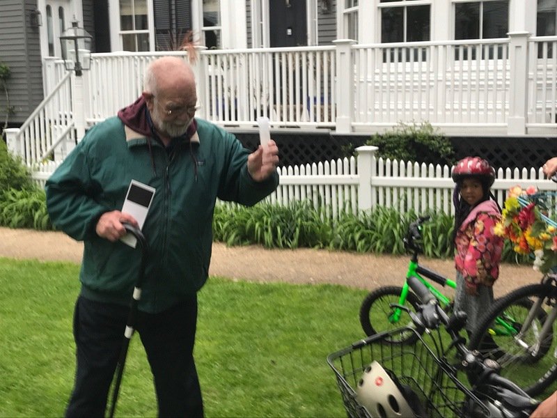 Roger blessing the bicycles on the lawn of the UU Meetinghouse (2019)