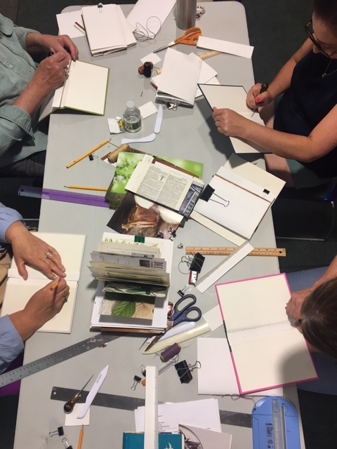everyone learning to do the long-stitch