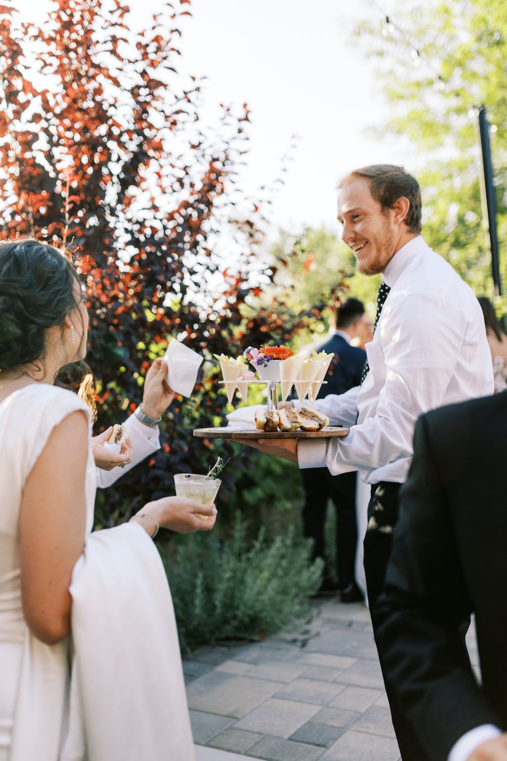 Cocktail hour catering at a backyard wedding in Los Angeles.