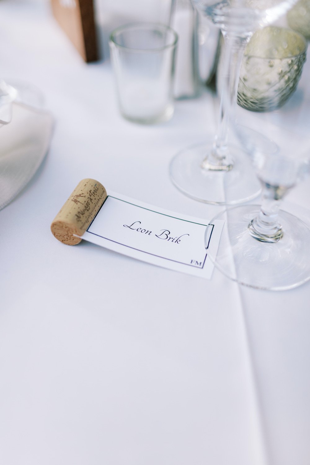Elegant backyard wedding cork place cards.