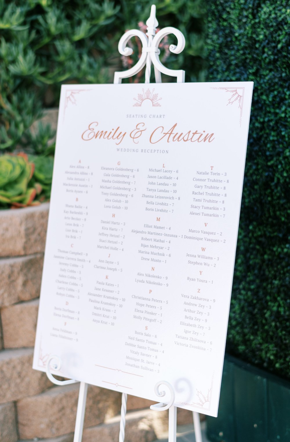 Wedding reception custom white seating chart sign.