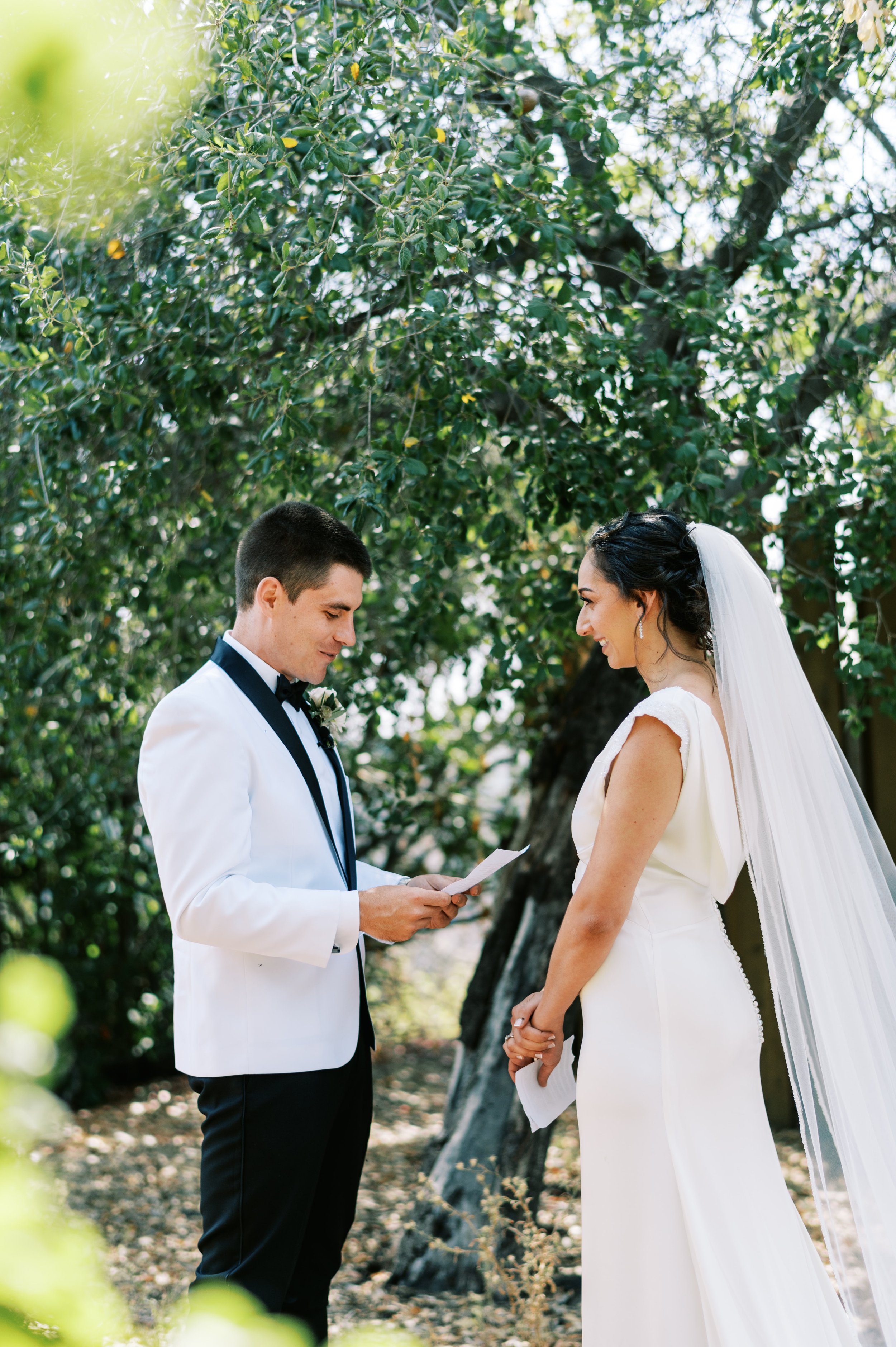 Elegant backyard wedding private vow reading in Los Angeles.