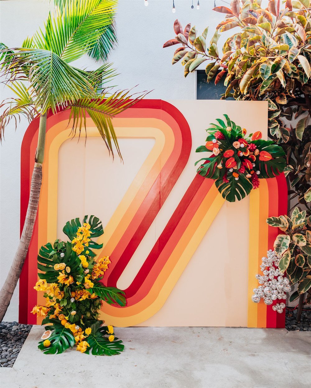 Retro 70's themed wedding photo backdrop at Kim Sing Theatre in Los Angeles.