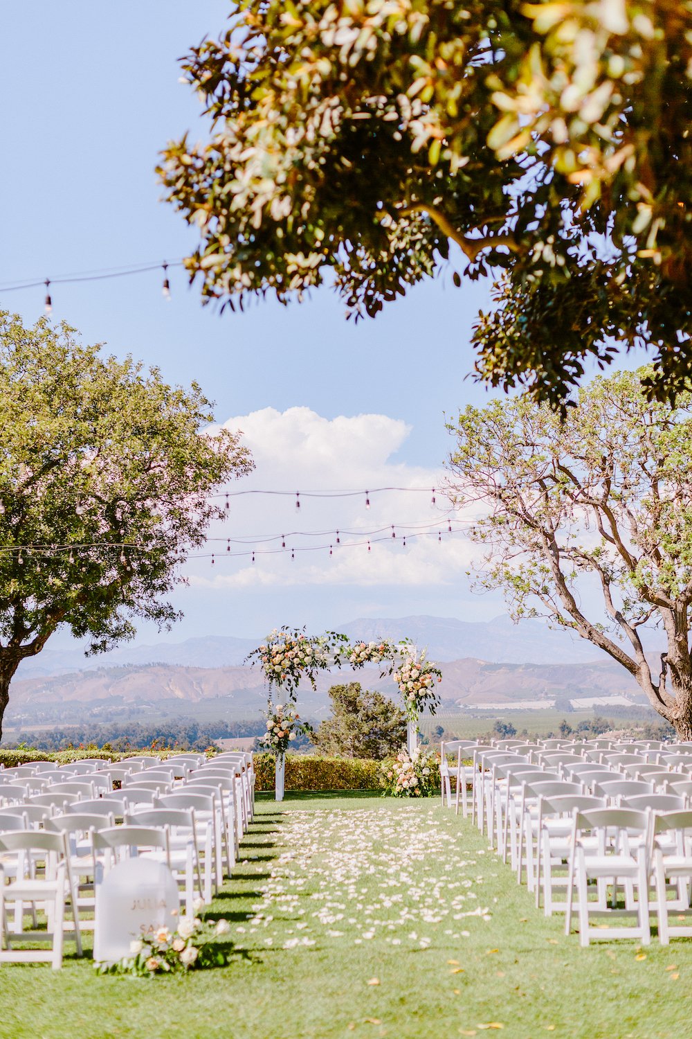 Outdoor garden wedding ceremony at the Spanish Hills Country Club in Los Angeles.