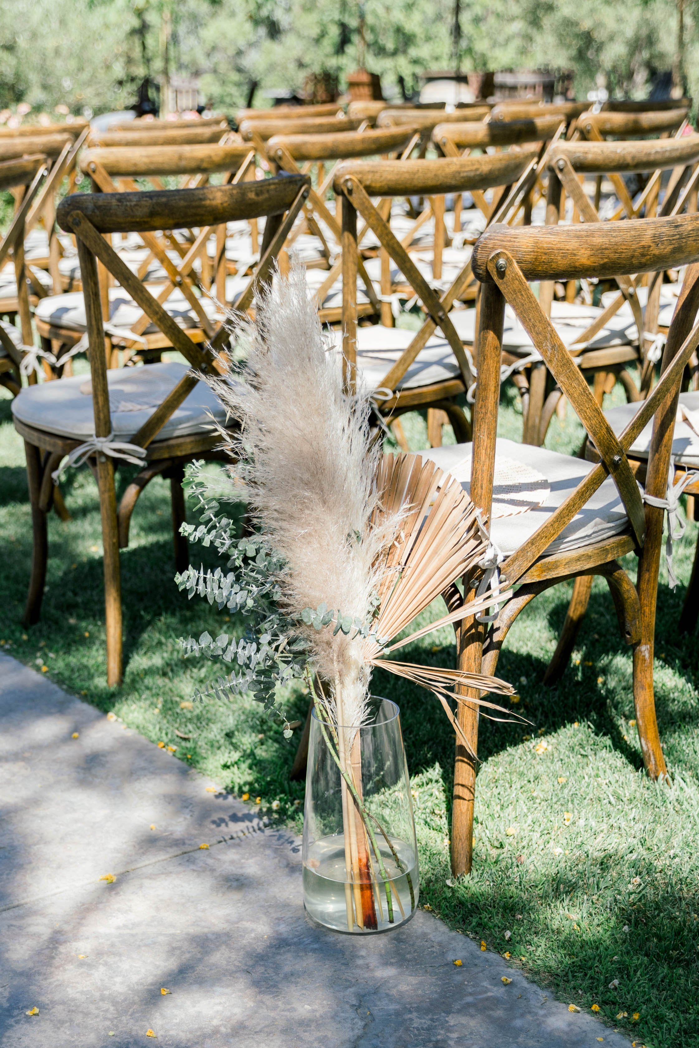 Boho wedding ceremony seating and decor at the Topa Mountain Winery. 