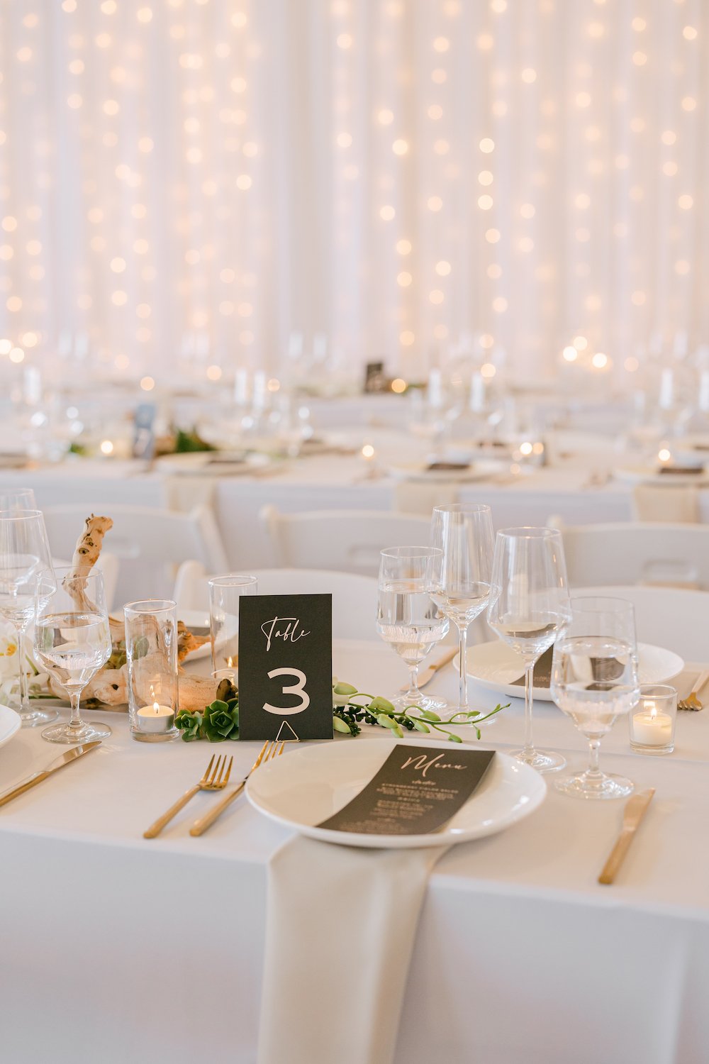 Modern wedding reception table decor at Malibu West Beach Club.