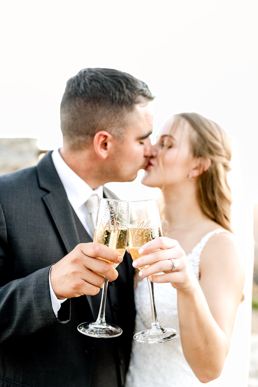 Bride and groom toast in celebration of their perfect Los Angeles wedding.