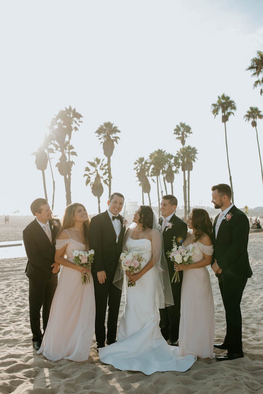  Southern California beach wedding party portrait with a cool and moody edit. 