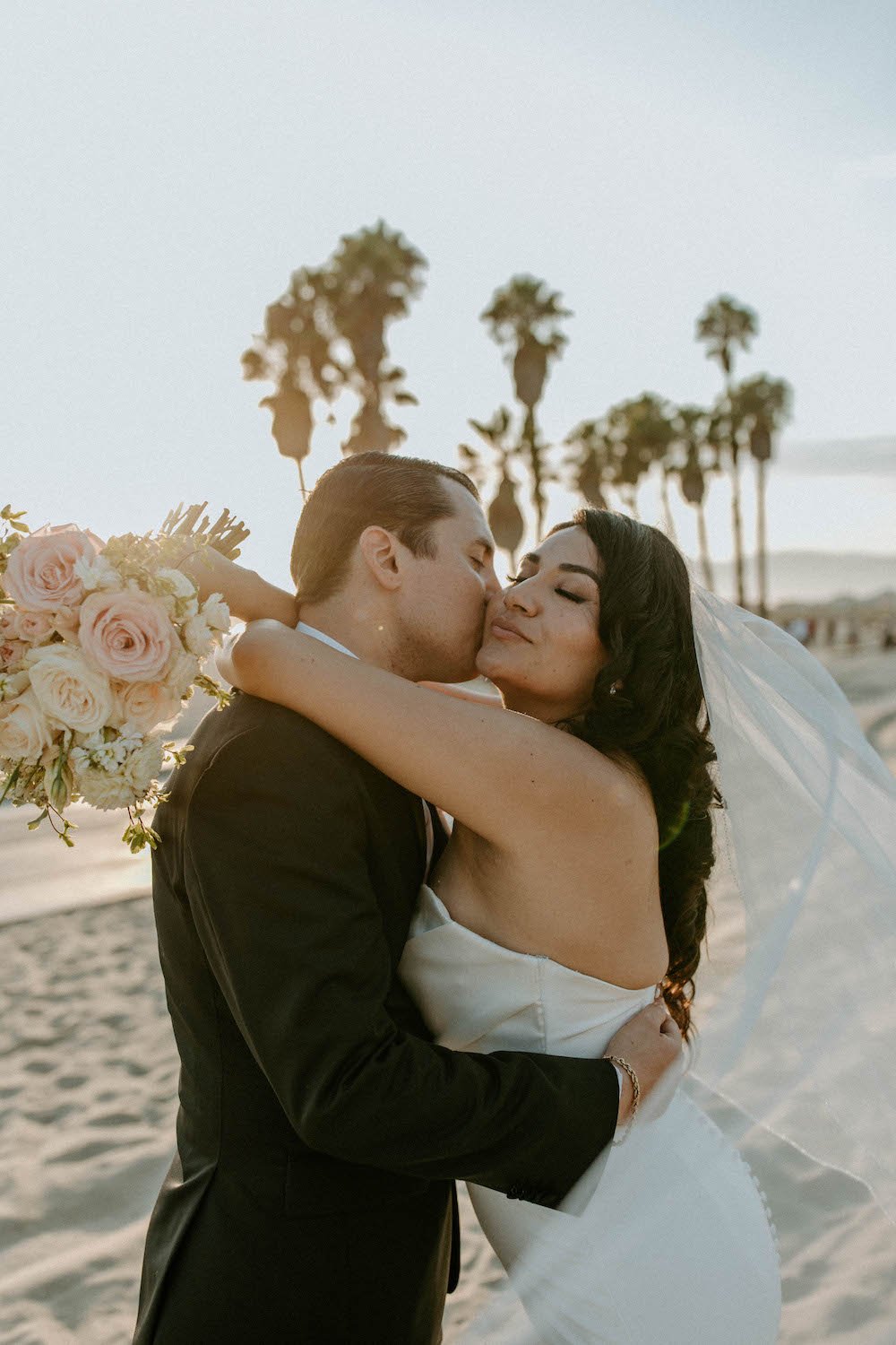  Southern California beach wedding bride and groom portrait with a cool and moody edit. 